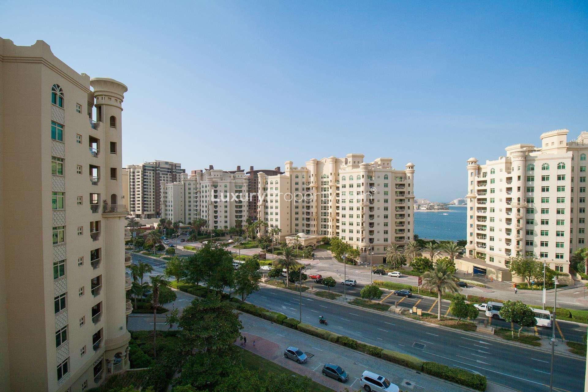 Shoreline Residences apartment view, Palm Jumeirah, showing sea and luxurious buildings for rent