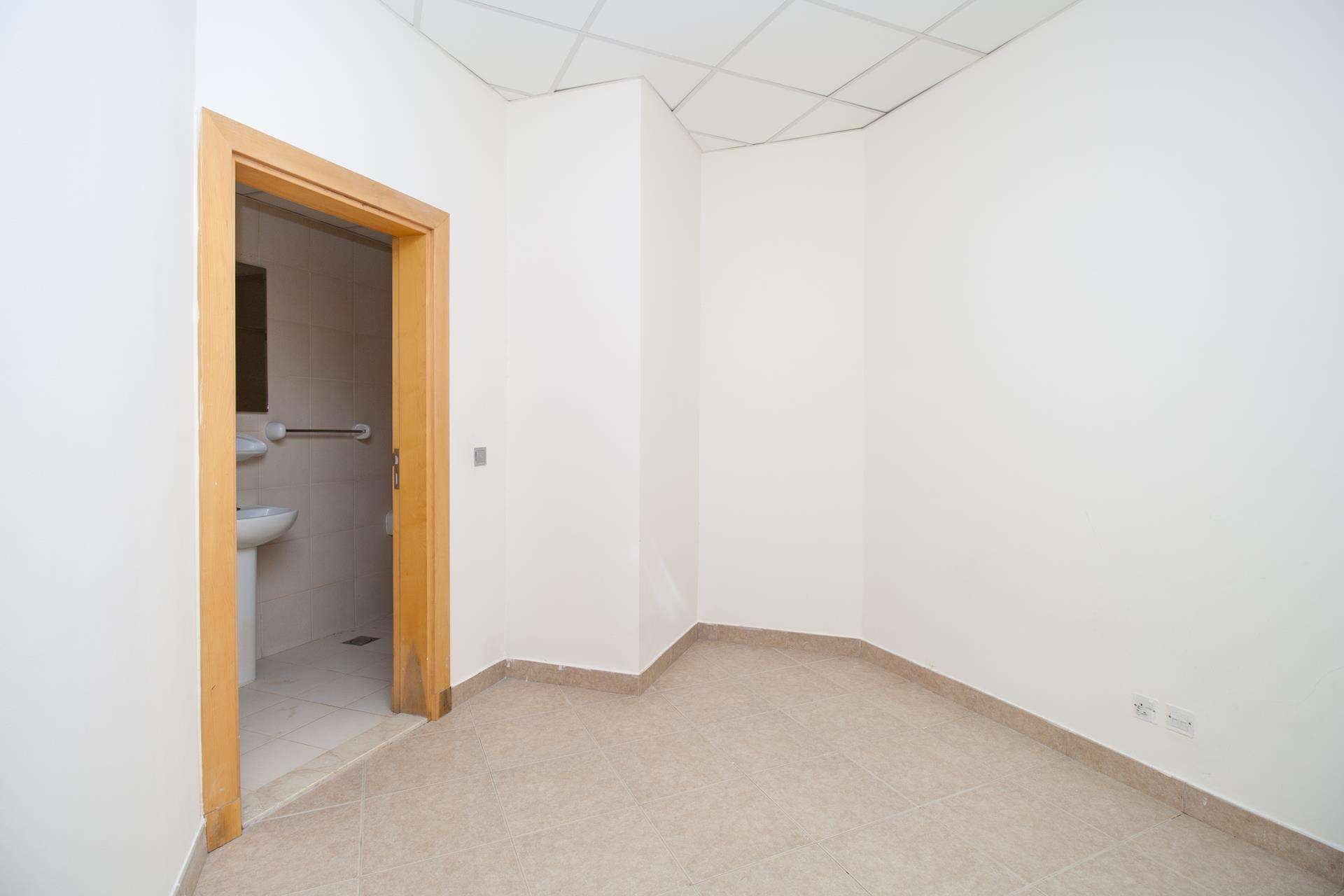 High-floor apartment interior with wooden doors in Shoreline Residences, Palm Jumeirah