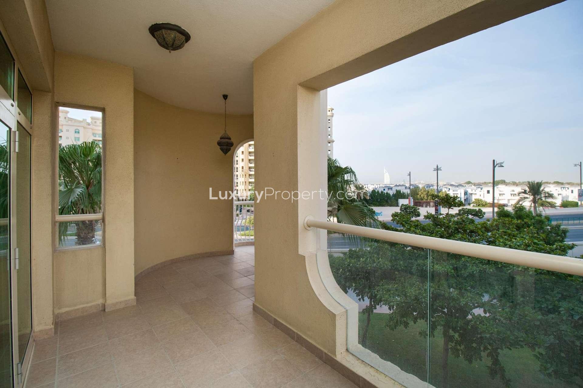 View from Shoreline Residences apartment, Palm Jumeirah, showcasing nearby buildings and lush greenery