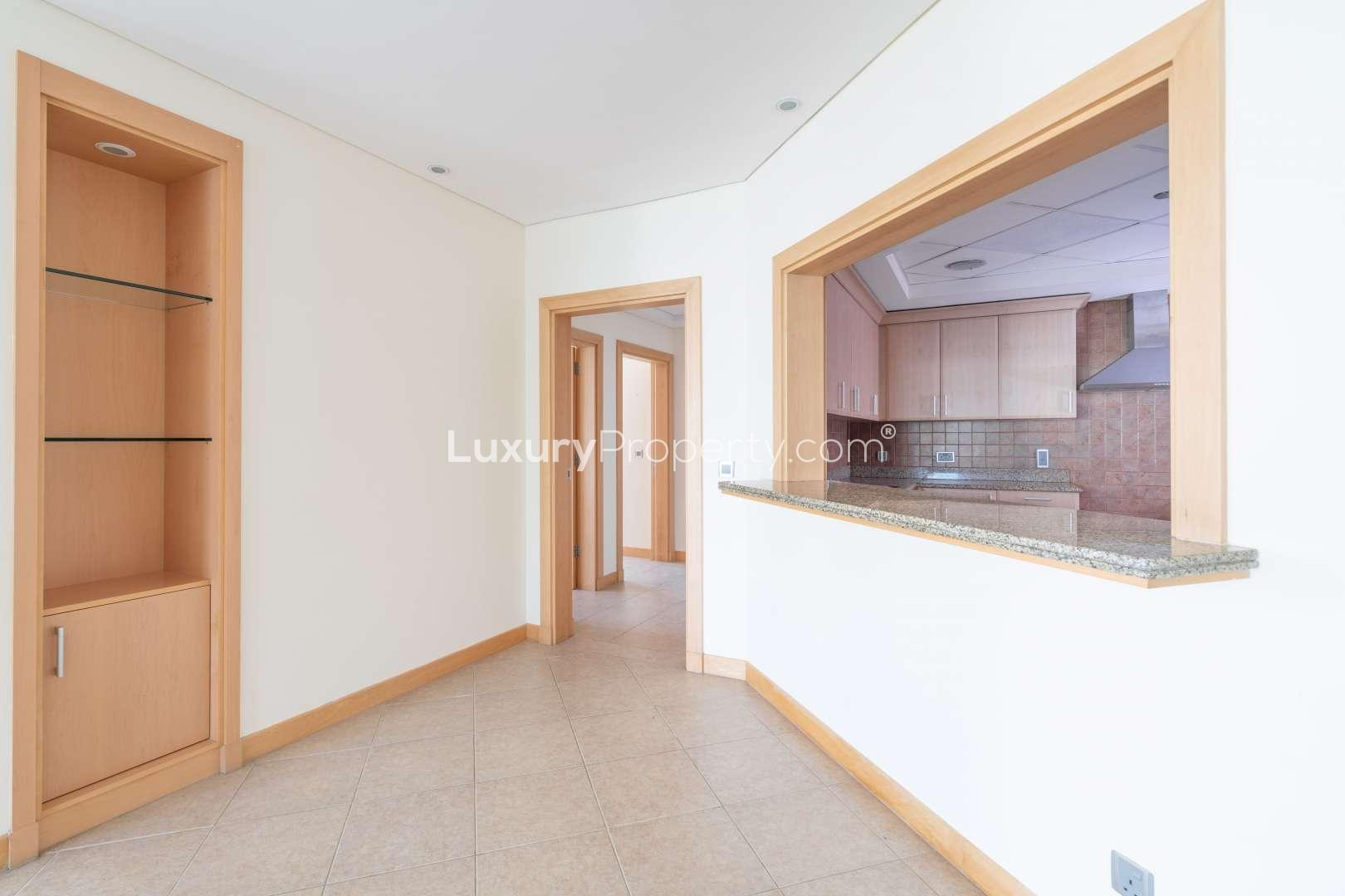 Spacious living area in three-bedroom apartment, Shoreline Palm Jumeirah, with sea views