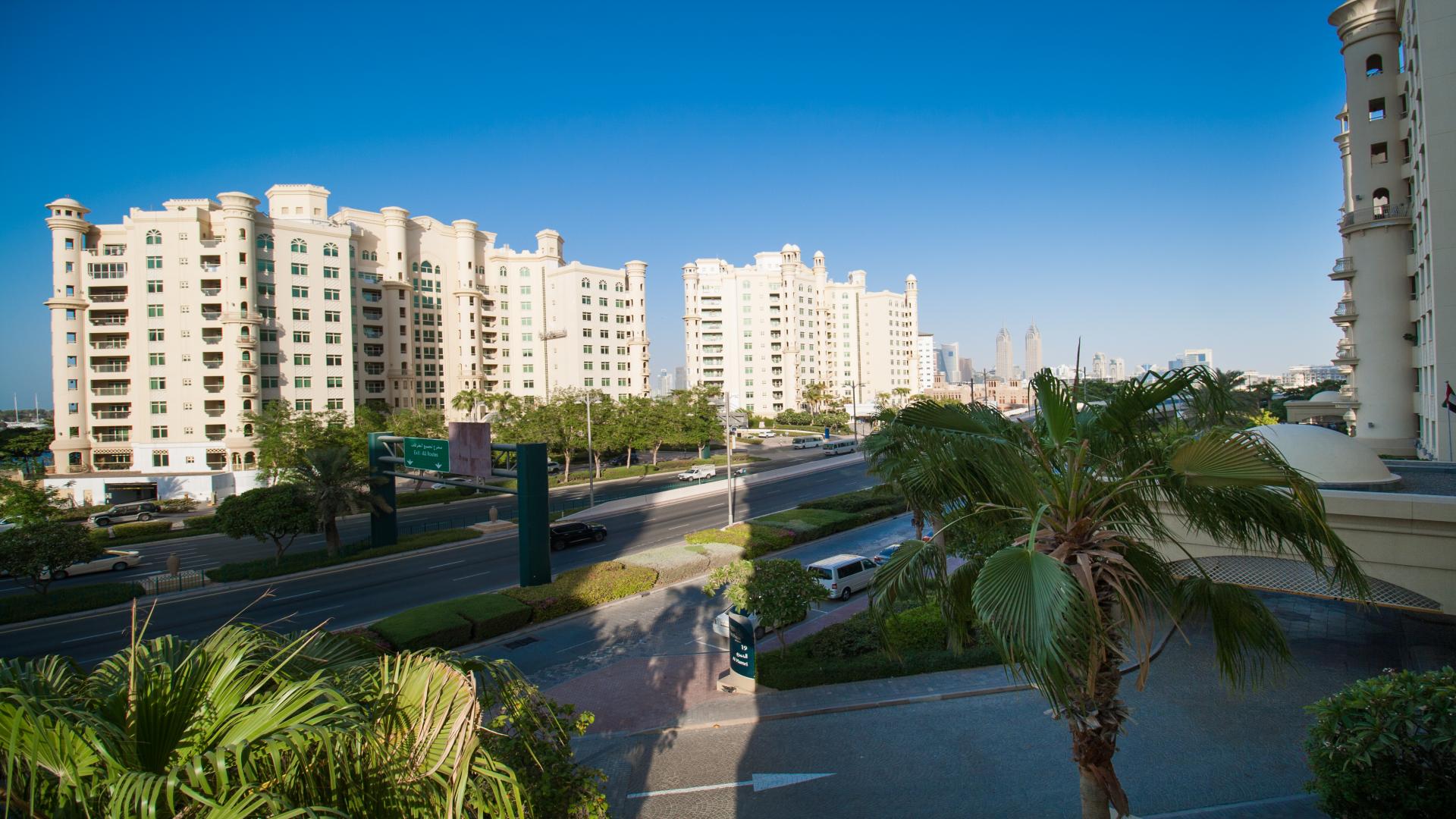 Spacious balcony view from Palm Jumeirah Shoreline Apartments, Dubai, showcasing coastal living