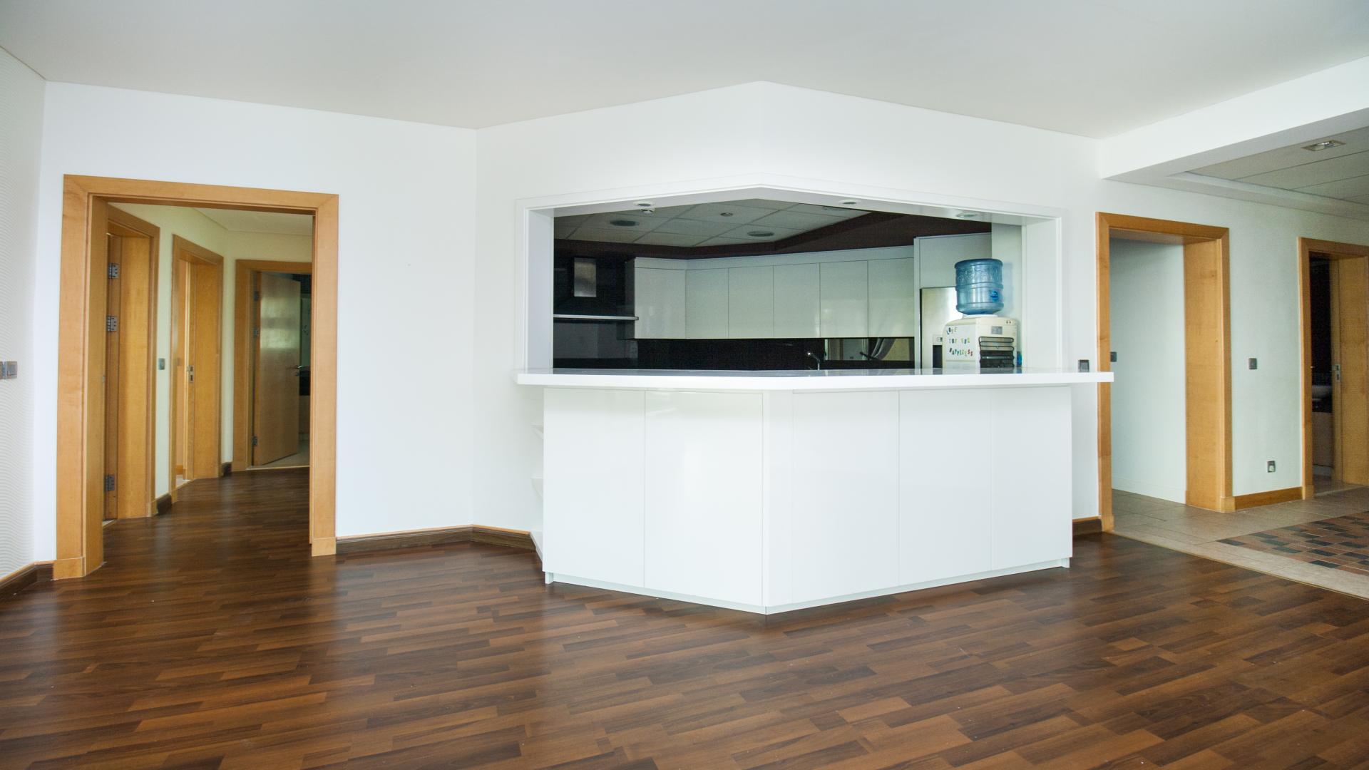 "Spacious Shoreline Apartments on Palm Jumeirah, offering coastal living and stunning views.",Modern kitchen in furnished 3-bedroom Type C apartment, Shoreline Apartments, Palm Jumeirah rental