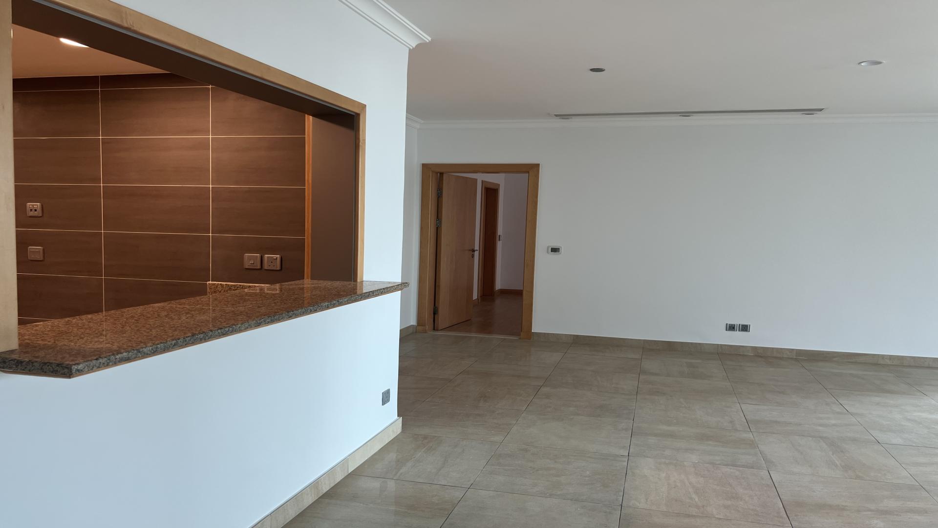 Spacious living area in upgraded Palm Jumeirah apartment with sea view and beach access