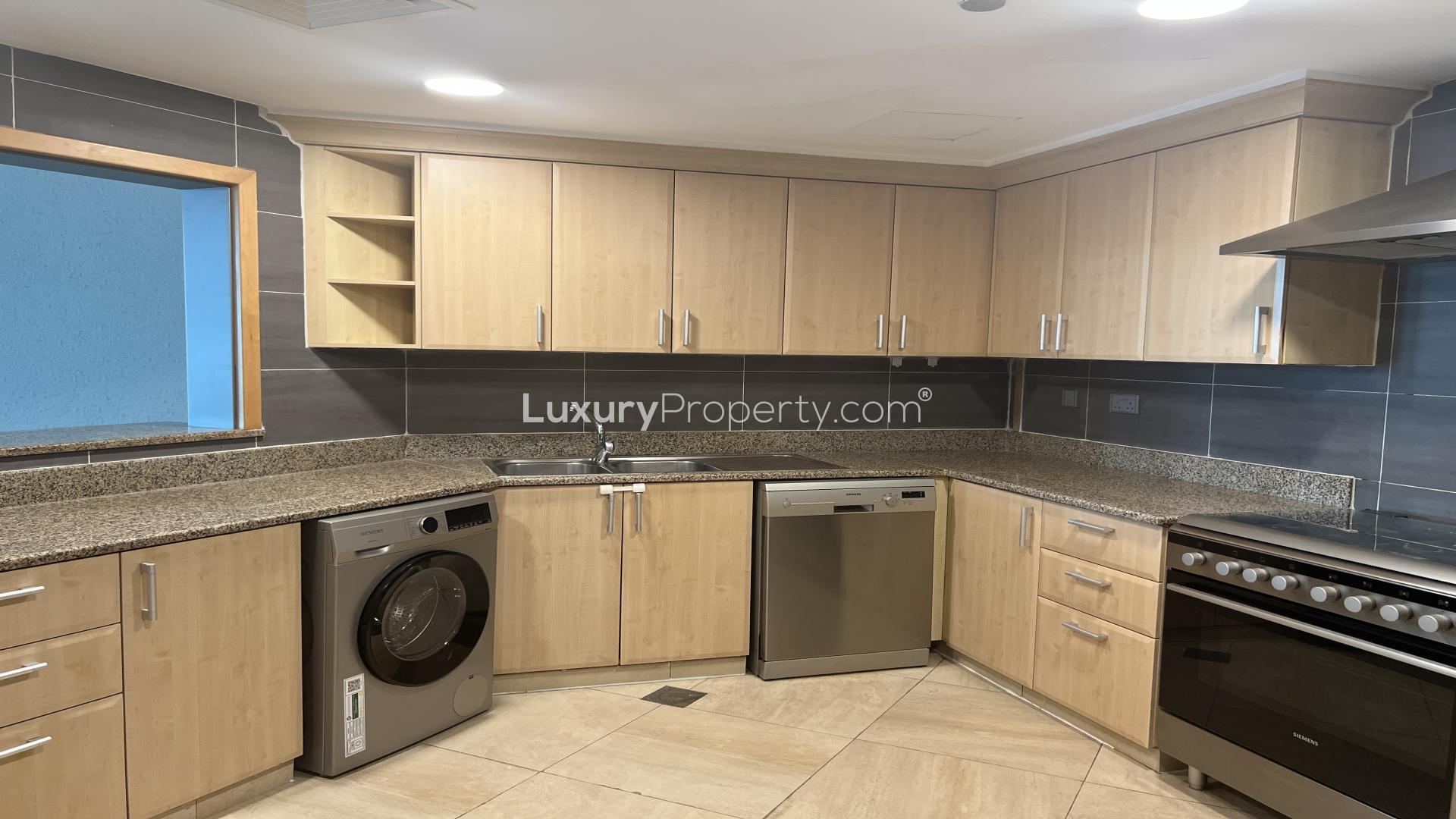 Modern living area in Palm Jumeirah Shoreline Apartment, featuring open layout and sleek finishes