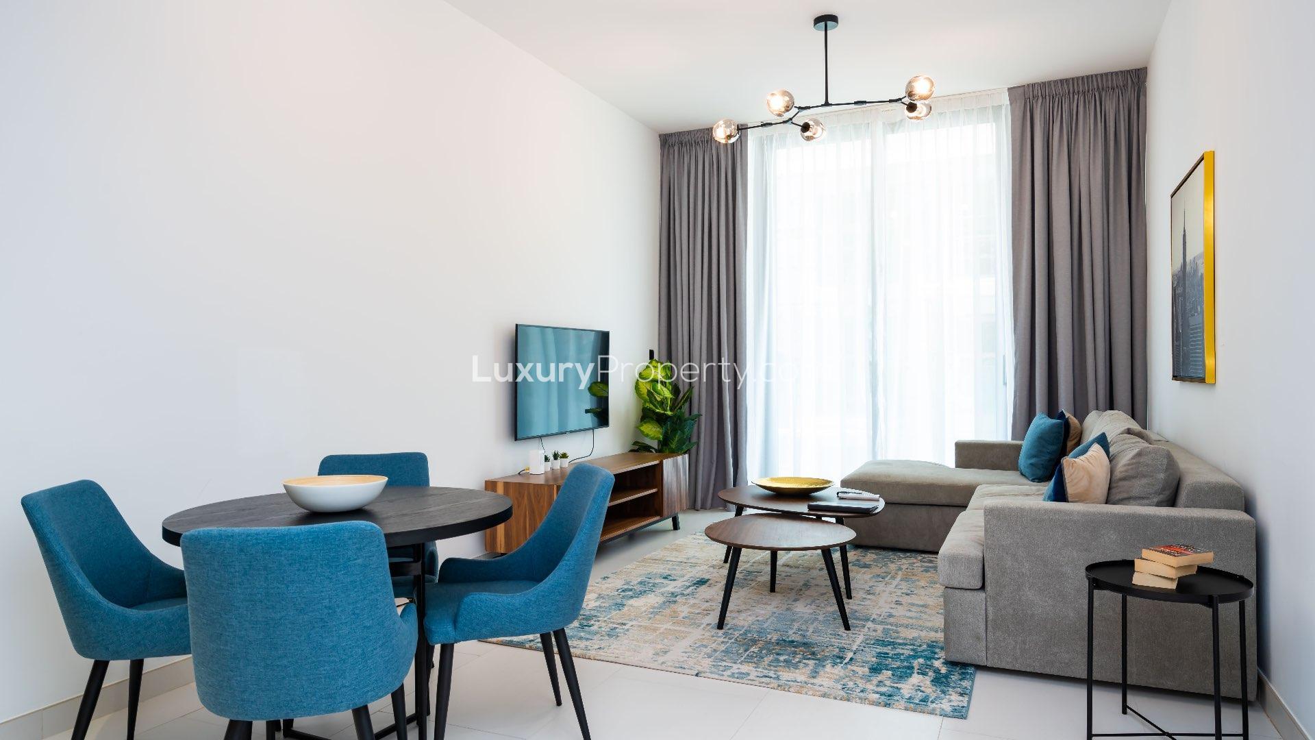 Luxurious living room in Palm Jumeirah apartment with modern decor and large windows