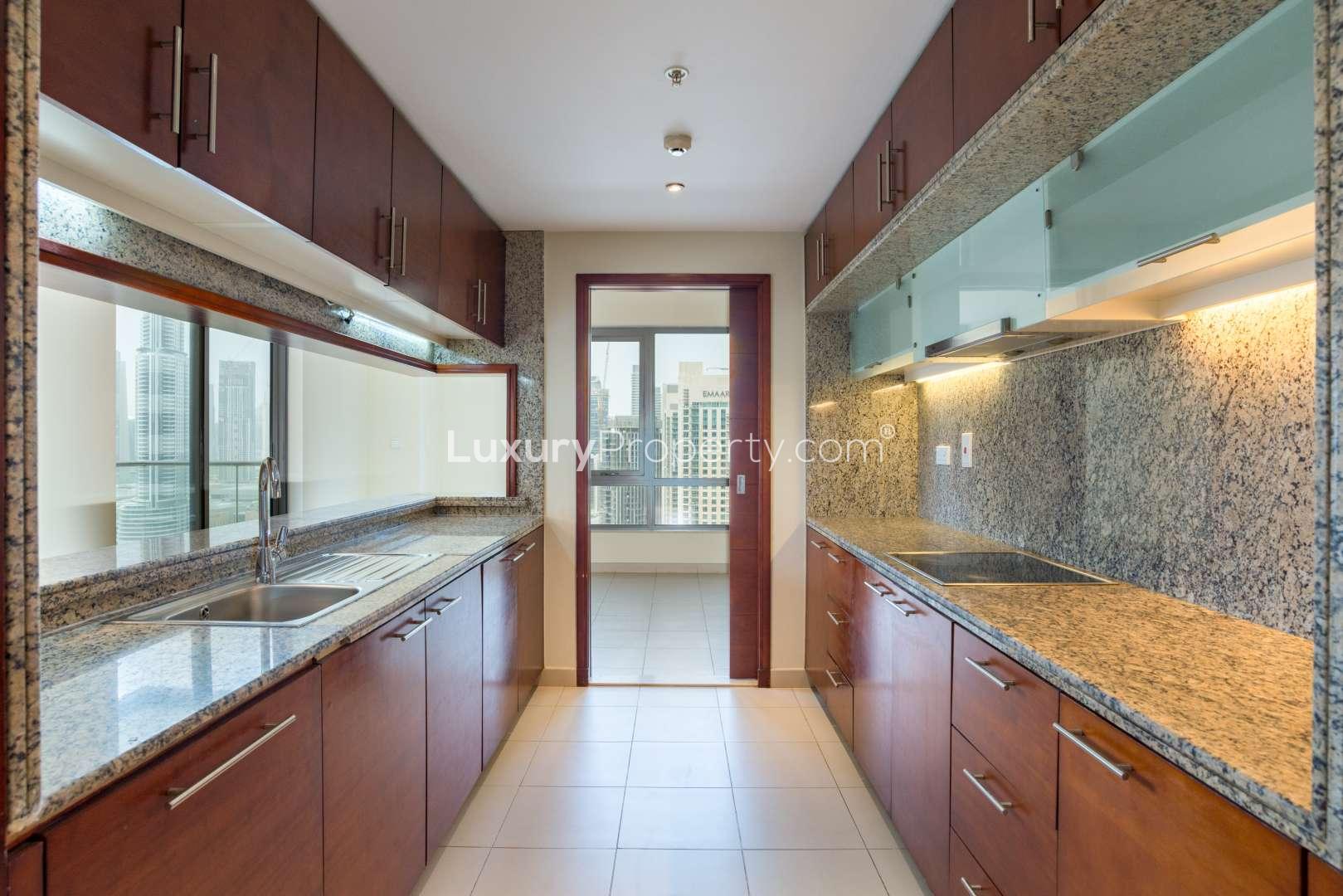 Spacious apartment interior with large windows and downtown Dubai skyline view in Southridge