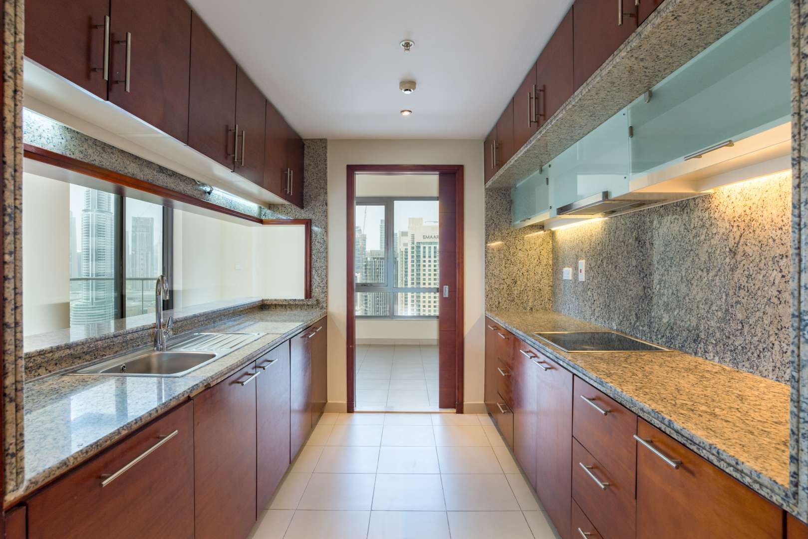 Spacious apartment interior with large windows and downtown Dubai skyline view in Southridge