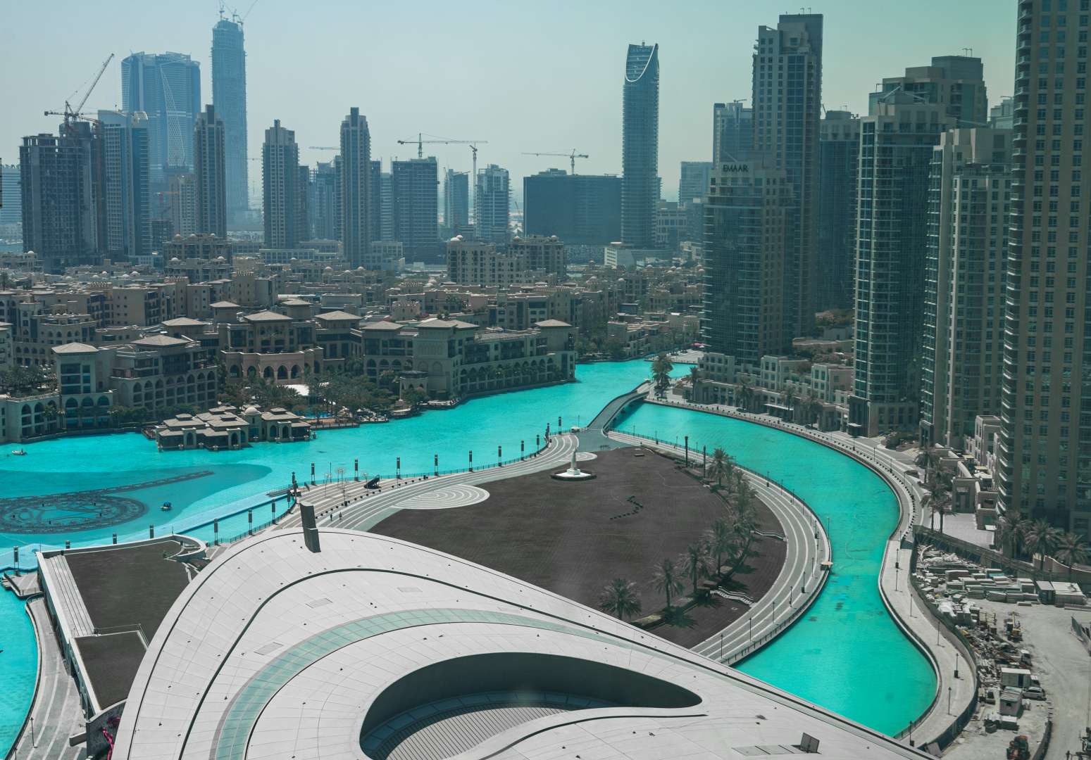 Aerial view of Standpoint Tower pool area, Downtown Dubai apartment complex, lush greenery surrounds
