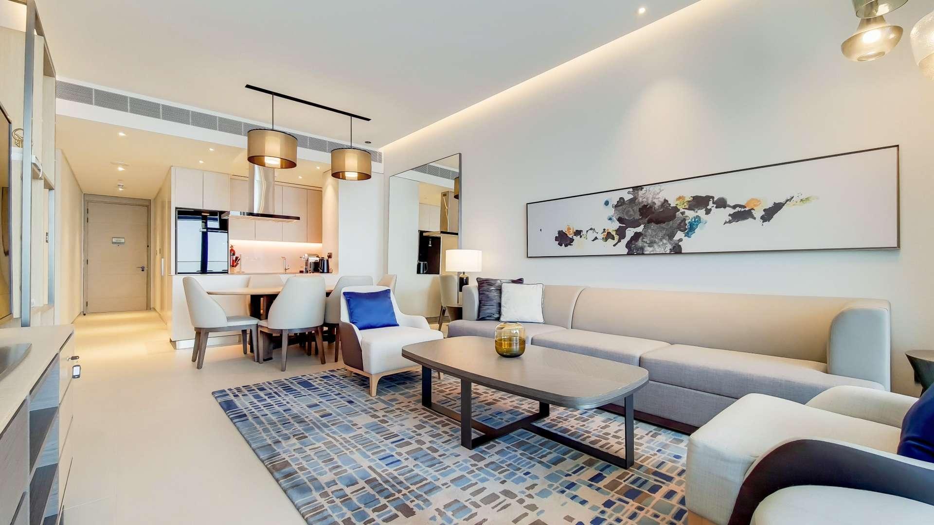 Aerial view of Jumeirah Beach Residence and Dubai Eye, near serviced apartment for rent