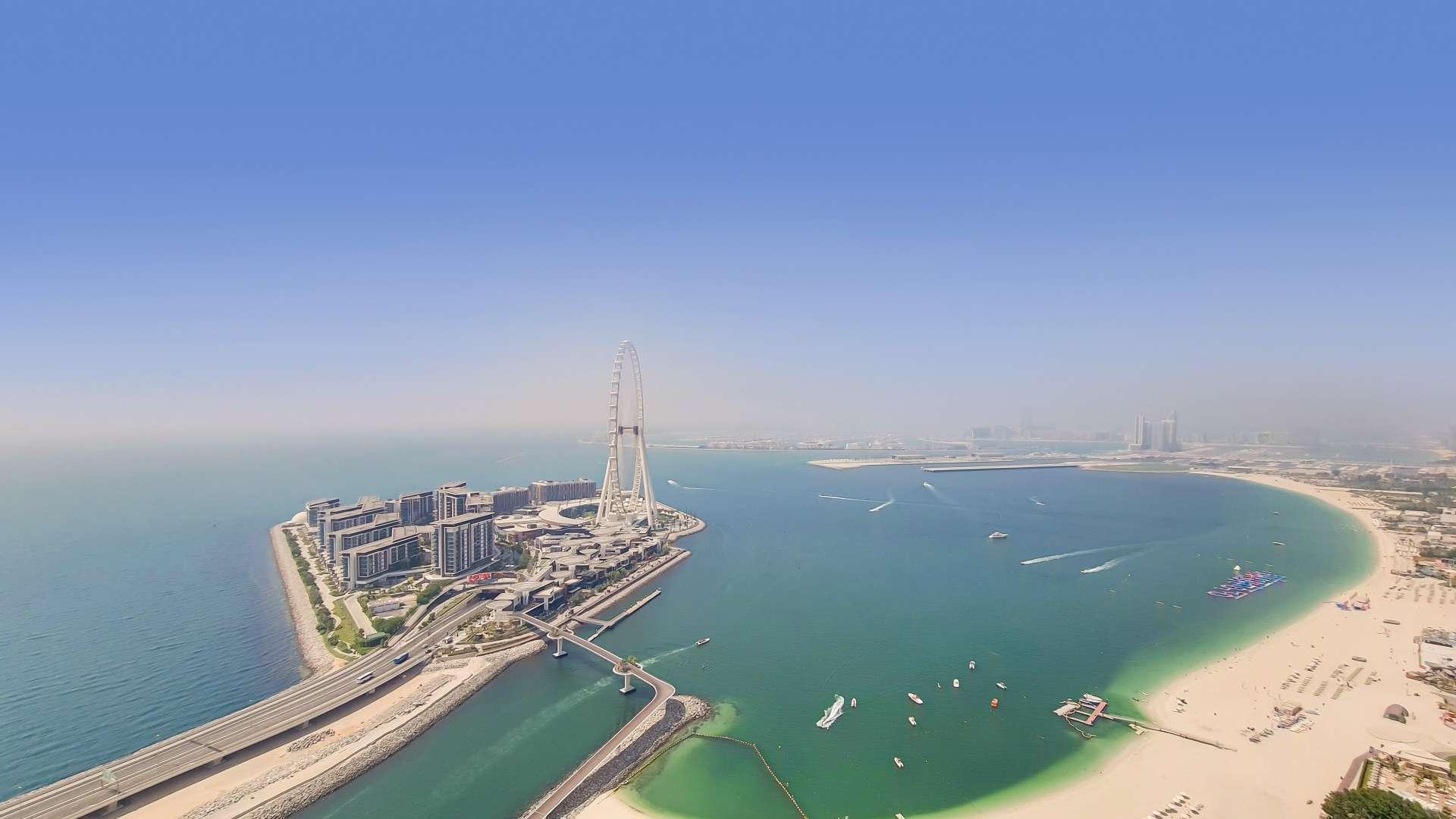 Luxurious furnished living room in Jumeirah Beach Residence apartment, modern decor, sea view