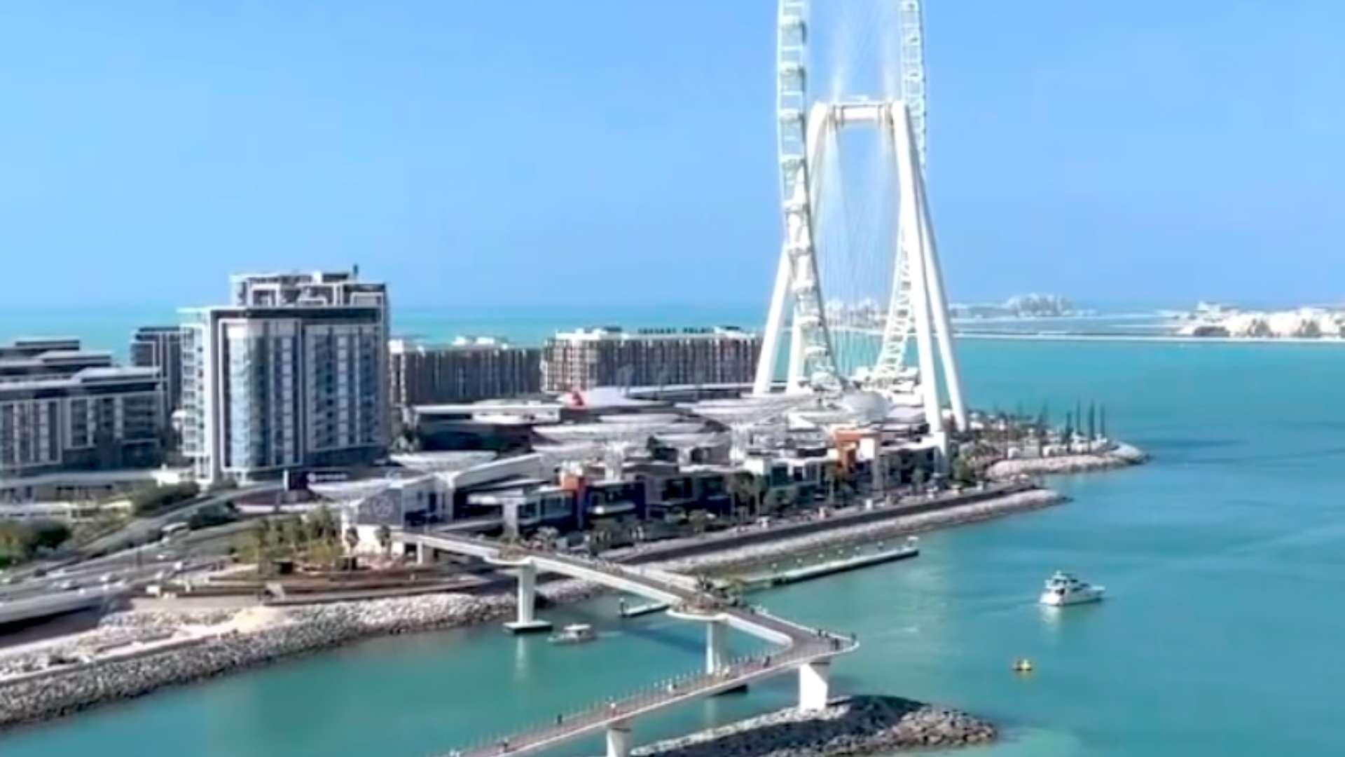 Aerial view of Address Beach Resort Dubai with stunning waterfront and iconic skyline