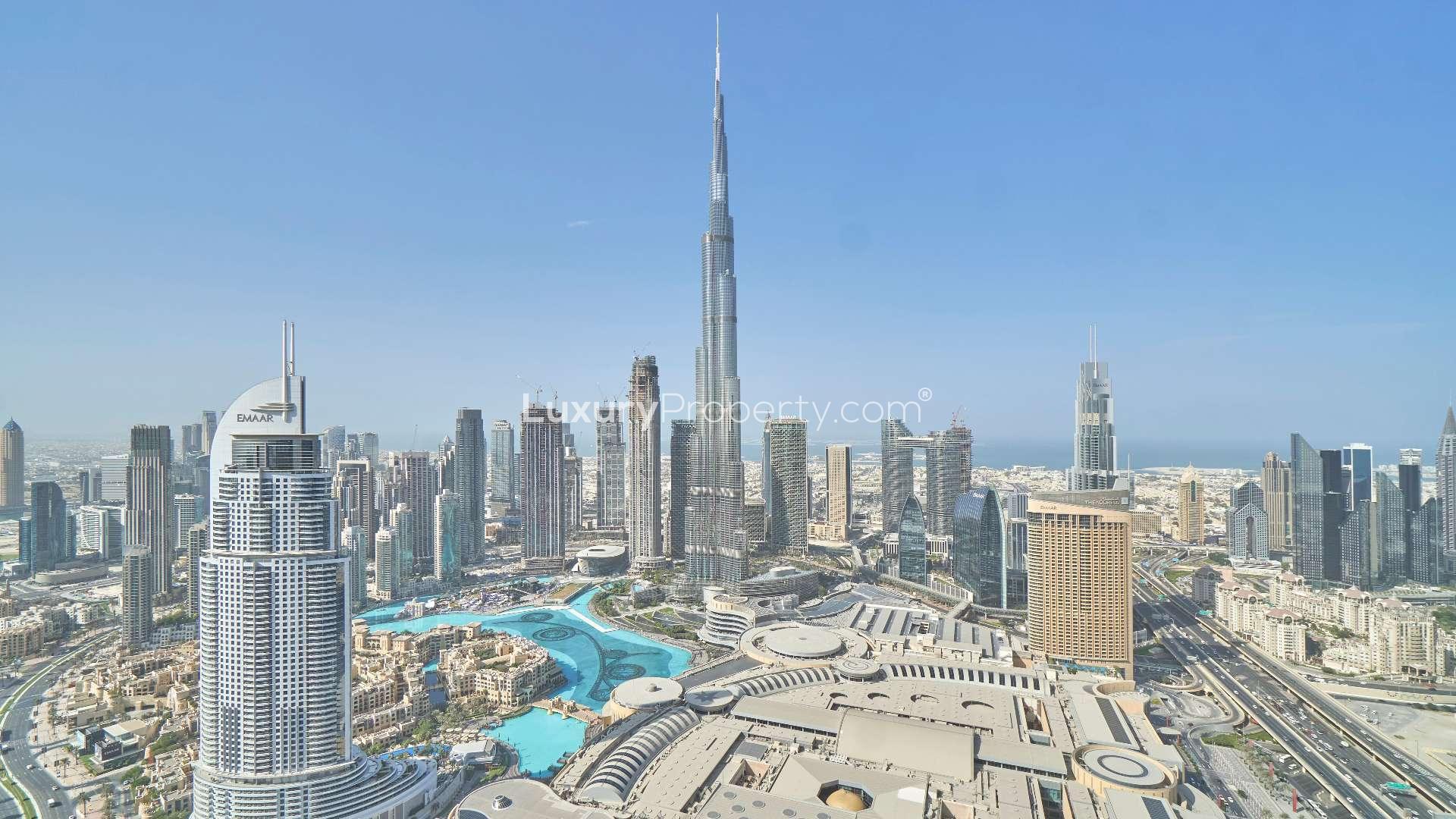 Balcony view from luxury apartment in Downtown Dubai overlooking city skyline and Burj Khalifa