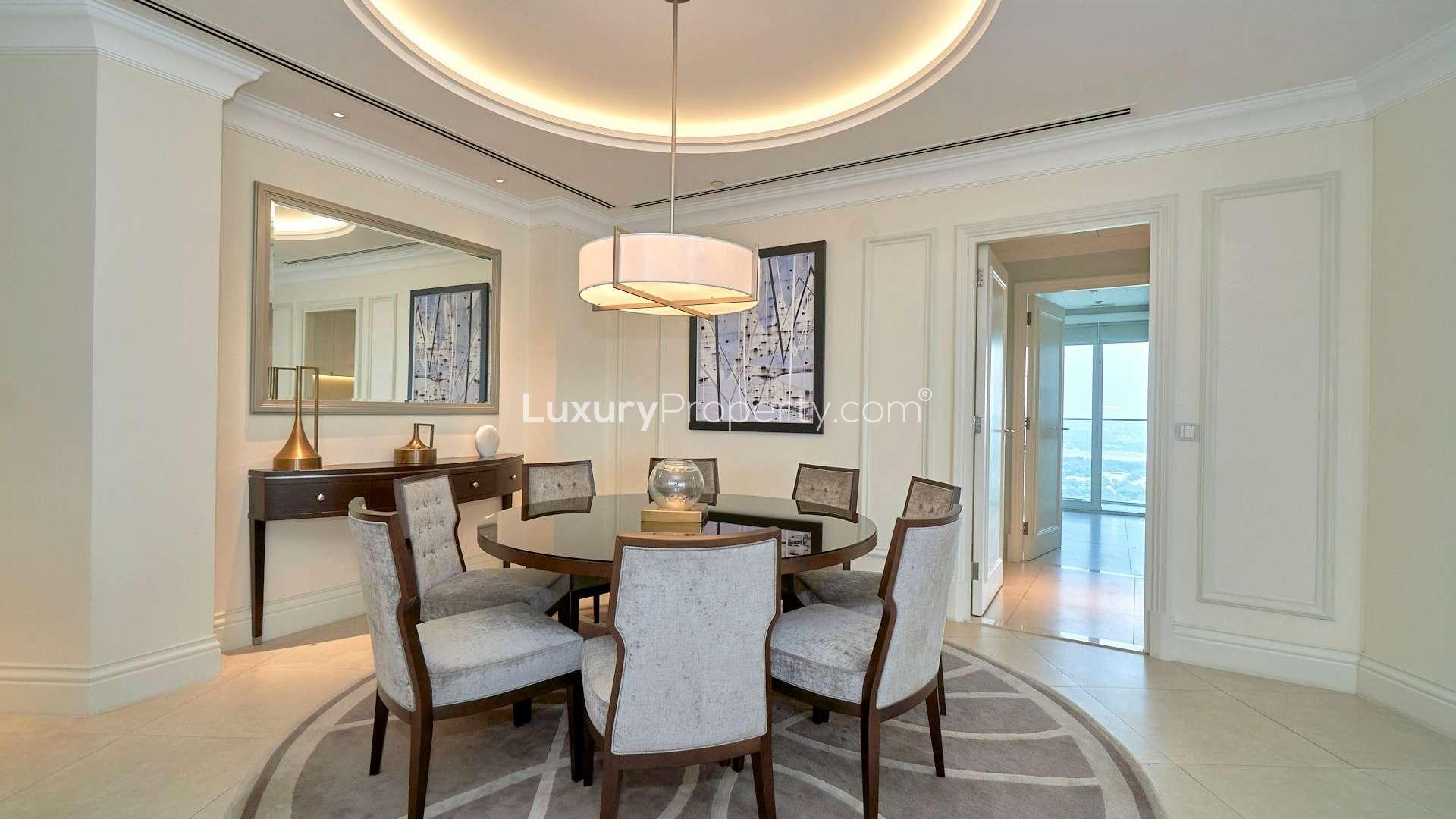 Modern furnished living room in Downtown Dubai apartment, featuring elegant decor and spacious layout