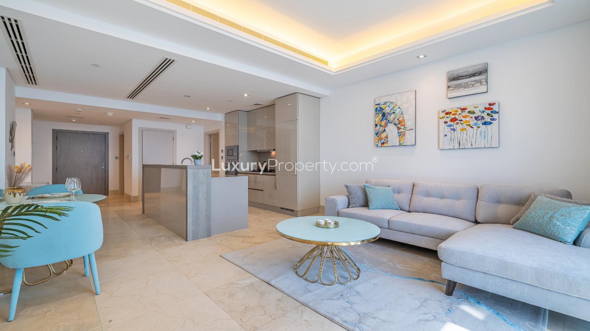 Modern Palm Jumeirah apartment living room with sea views, stylish decor, and natural light