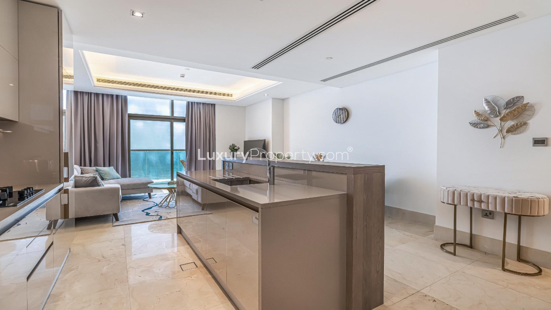 Modern living room with sea view in Palm Jumeirah apartment, The Crescent