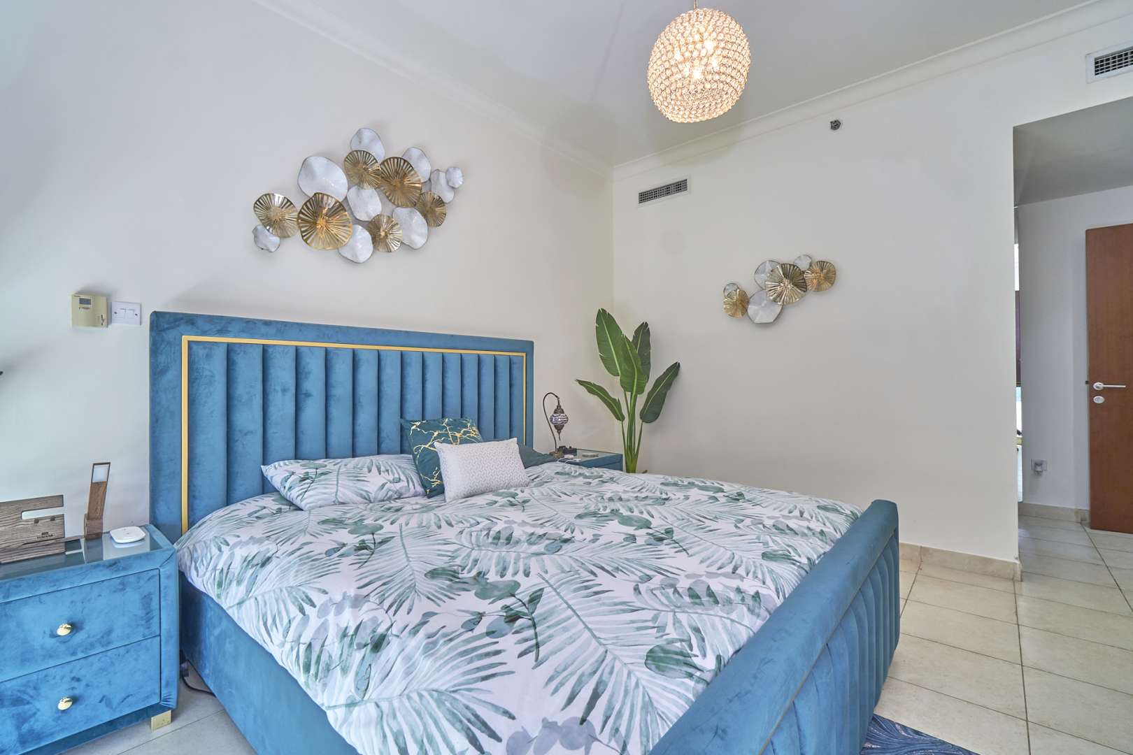 Luxurious living room with modern decor and panoramic views in The Fairways apartment