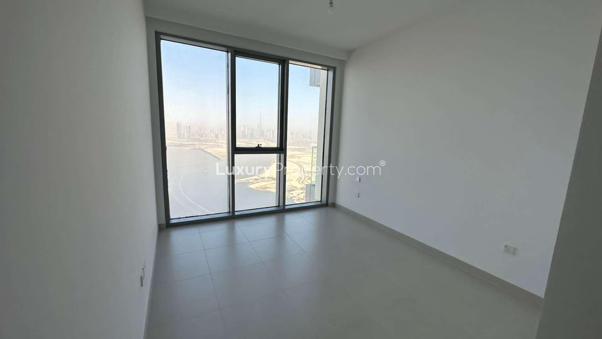 Empty bedroom with built-in closet in The Grand, Creek Harbour apartment for rent