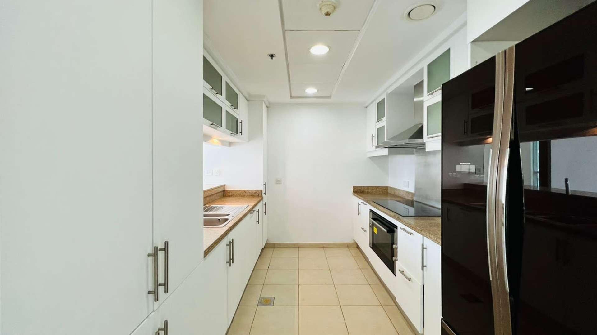 Bright living area with large windows, Burj Khalifa view in Downtown Dubai apartment for rent