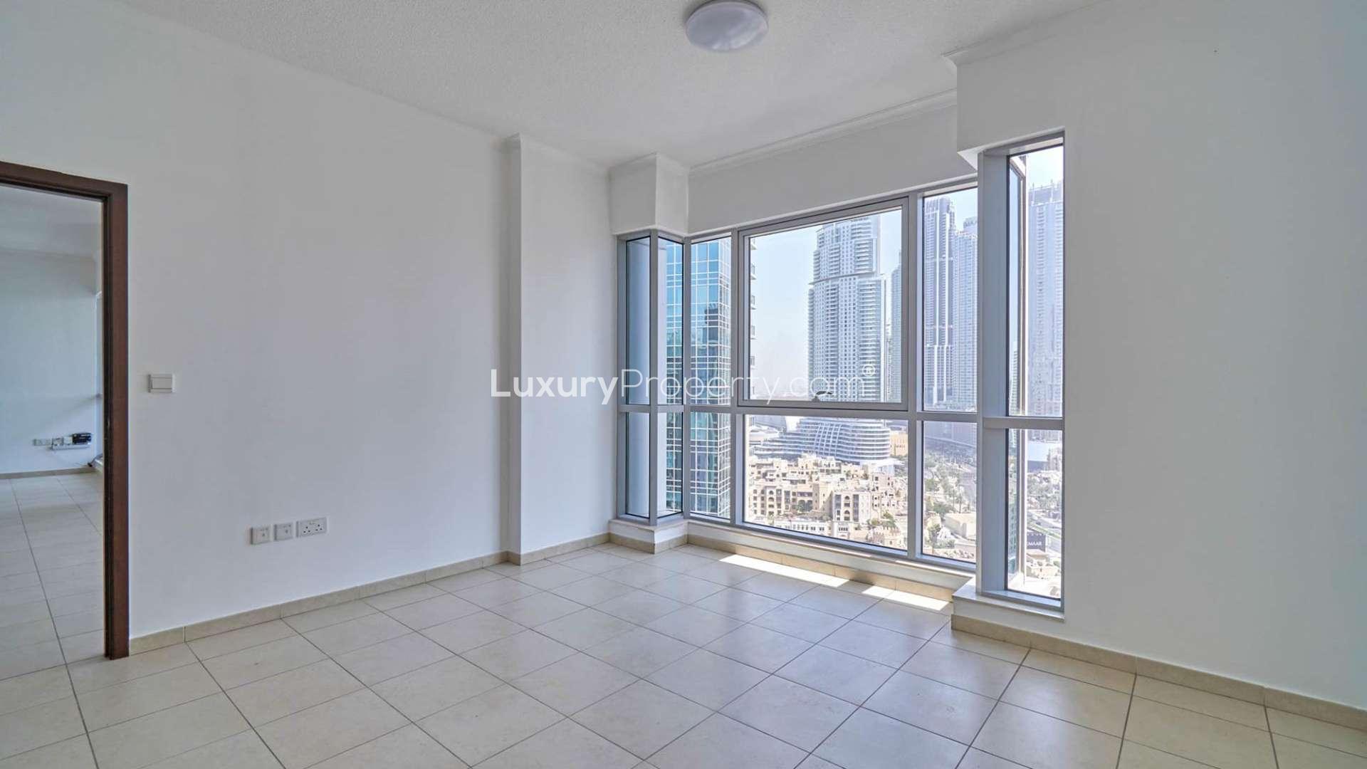 Modern kitchen in 3-bedroom apartment, Residences 8, Downtown Dubai, with sleek cabinets and appliances