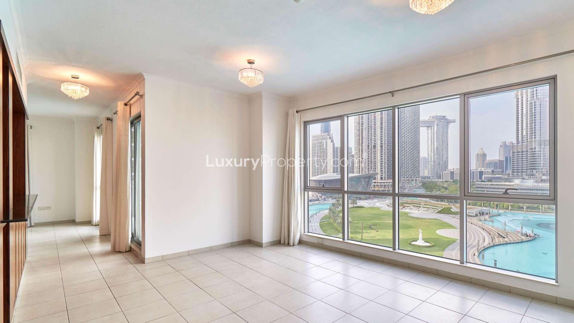 Spacious Downtown Dubai apartment with large window and stunning fountain view
