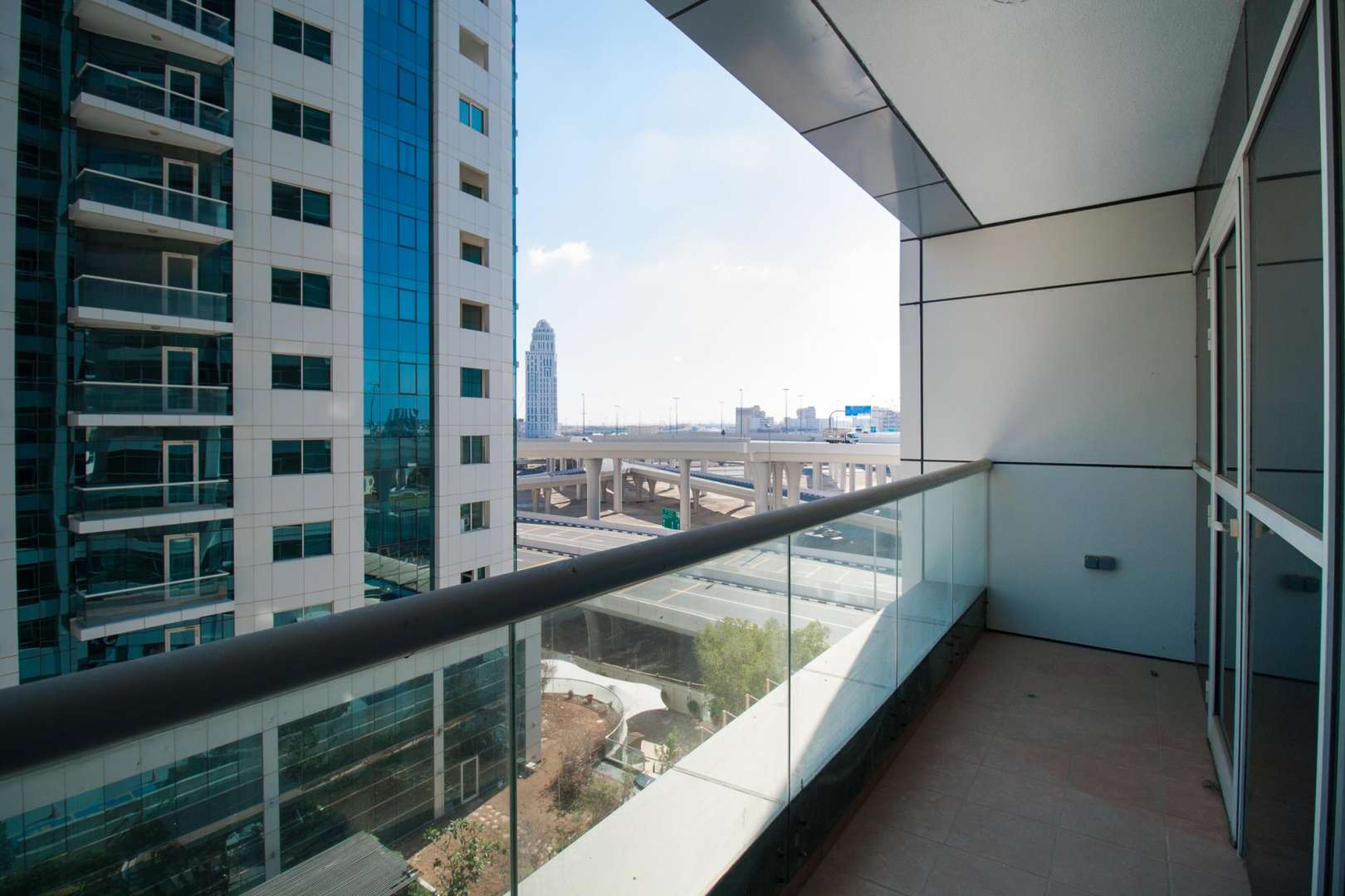 Modern kitchen in 3-bedroom apartment, The Zen Tower, Dubai Marina, with balcony access