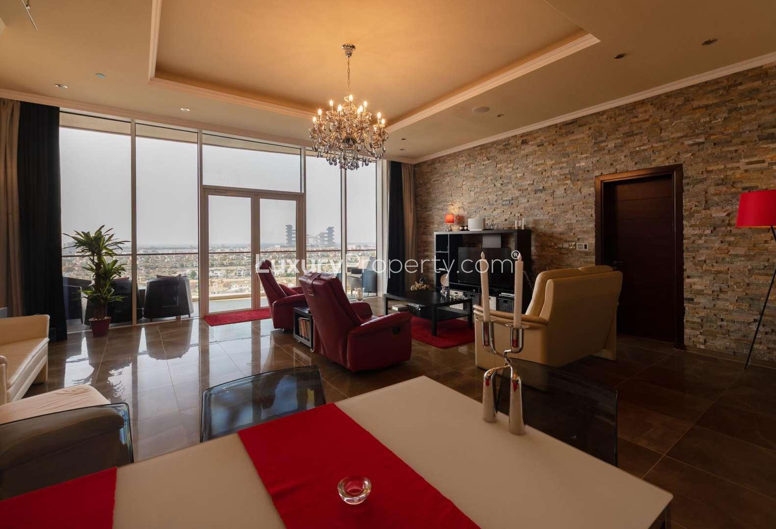 Luxurious living room in Palm Jumeirah apartment, Tiara Residences, with modern decor and sea view