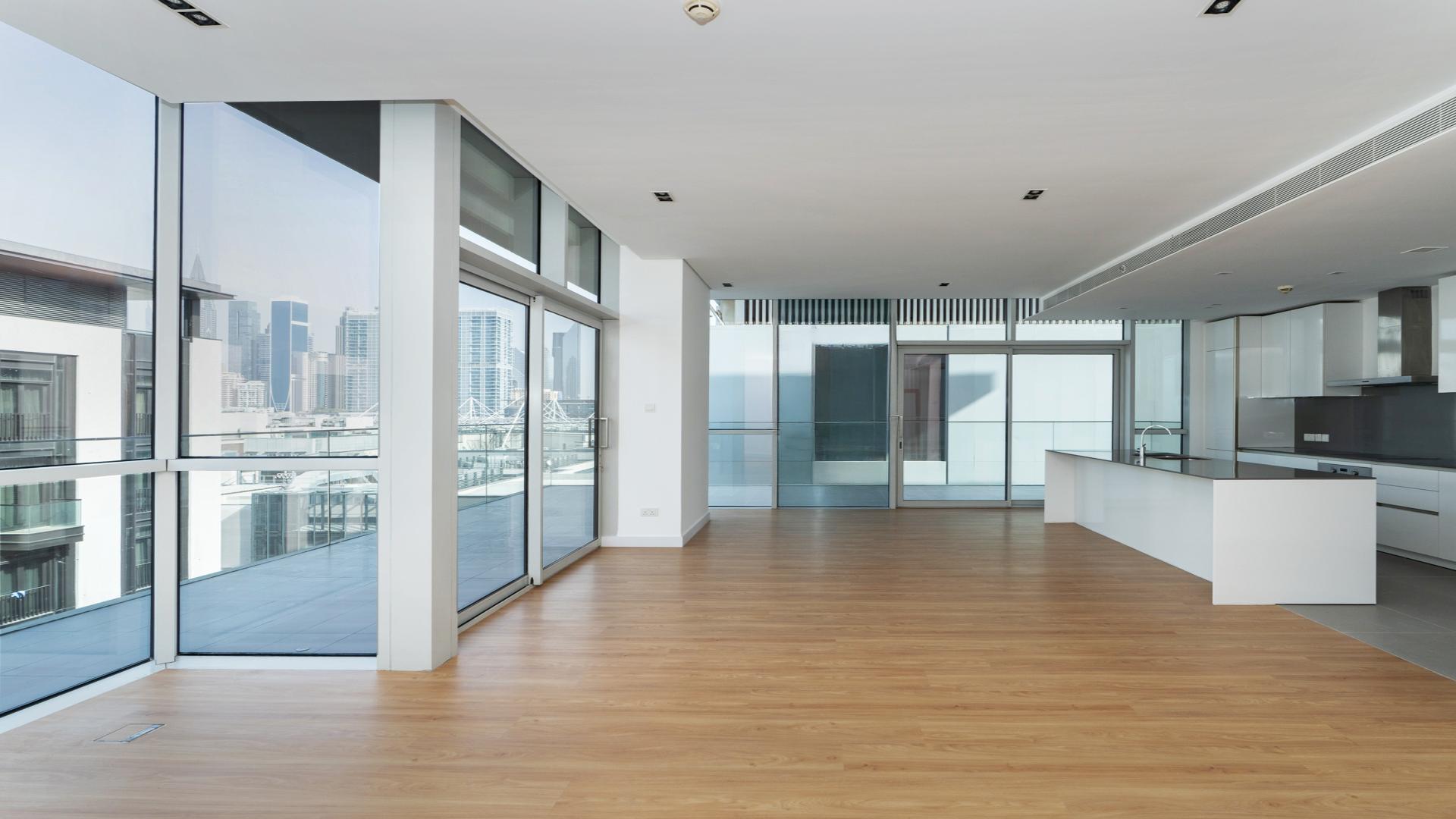 Spacious open-plan kitchen and living area in City Walk apartment, Building 25, for rent