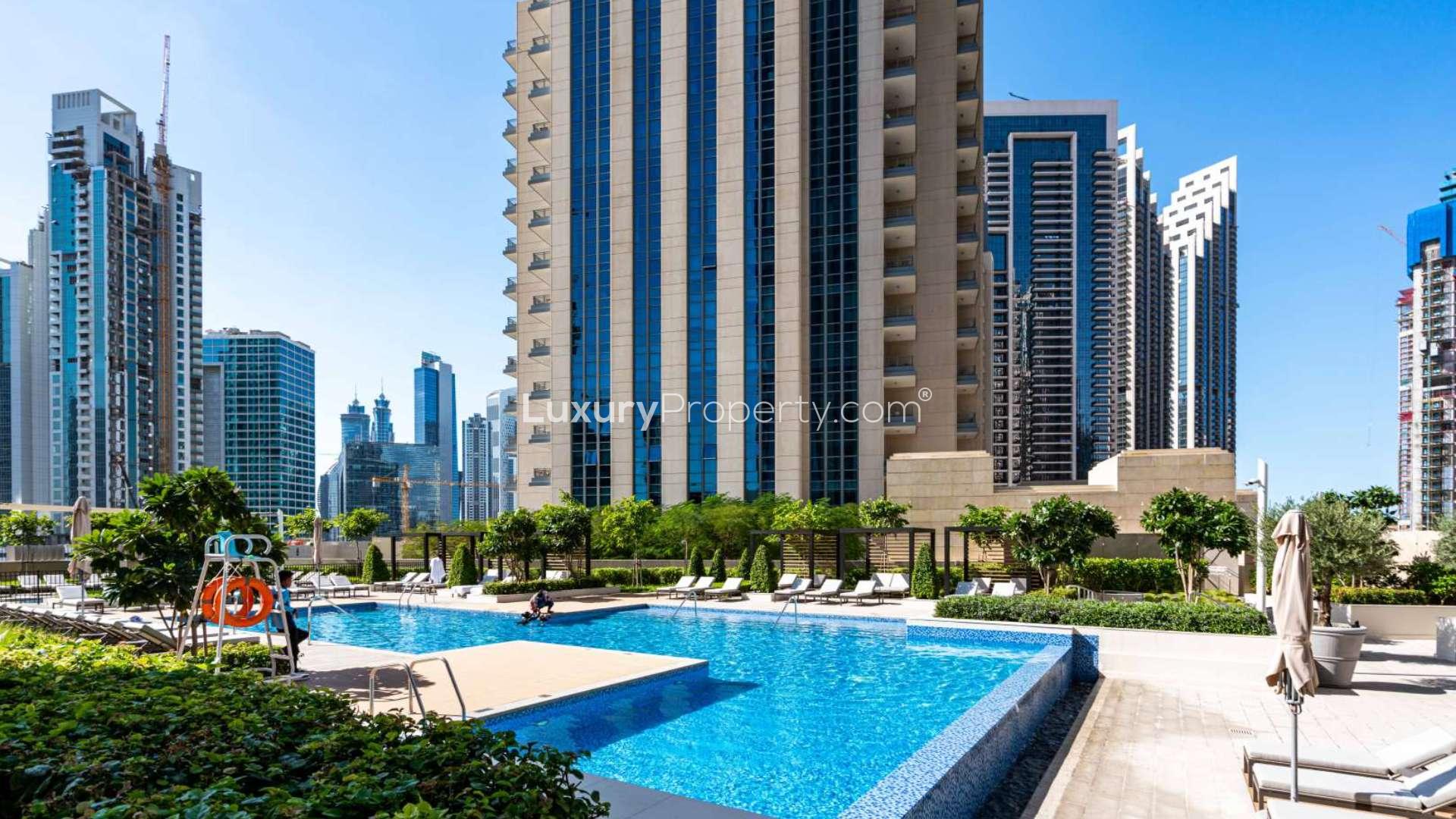 Modern bathroom in 3-bedroom apartment, Vida Residences Downtown, Dubai, with sleek fixtures and mirror