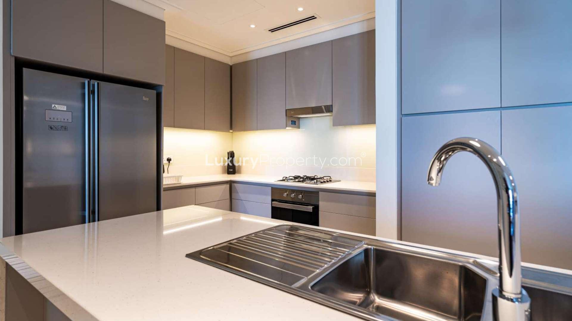 Outdoor pool area at Vida Residences Downtown Dubai with city skyline in background