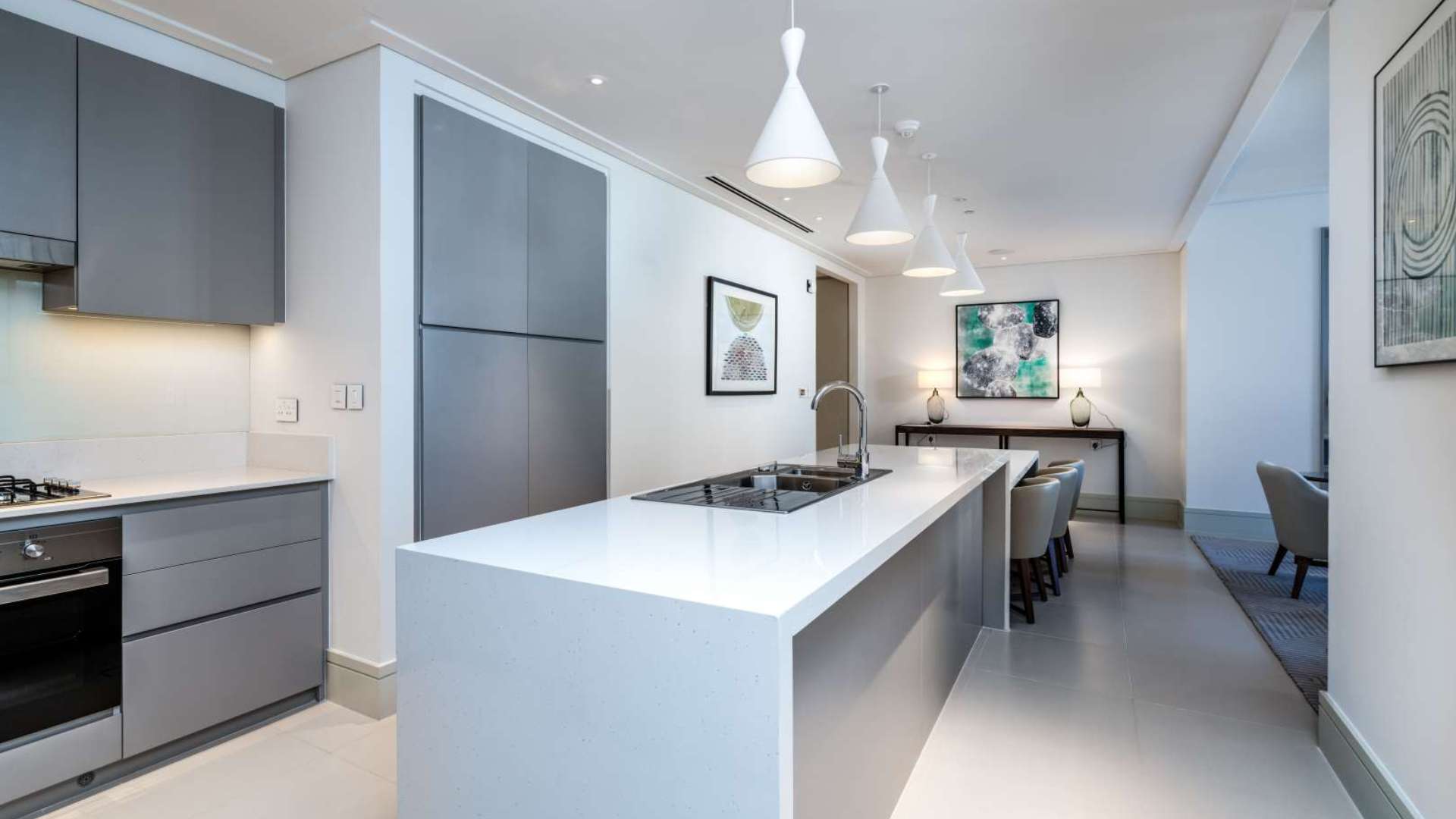 Elegant living room in 3-bedroom apartment at Vida Residences, Downtown Dubai. Modern decor, open layout