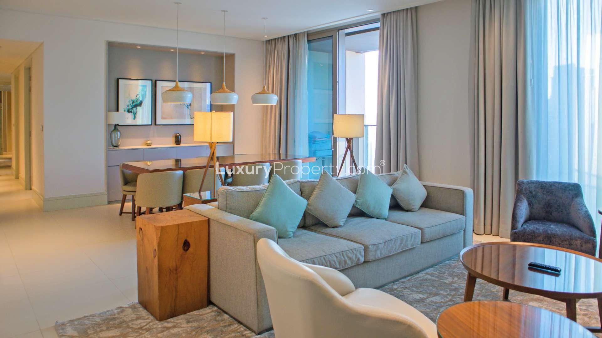 Furnished living and dining area in Vida Residence apartment, Downtown Dubai, with modern decor