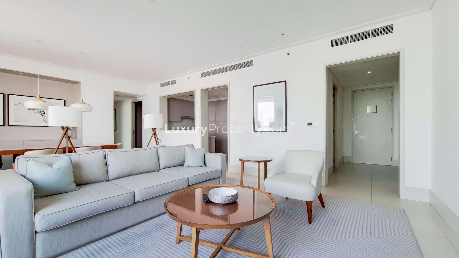 Modern living room in Vida Residence Downtown apartment, featuring scenic city views and elegant decor