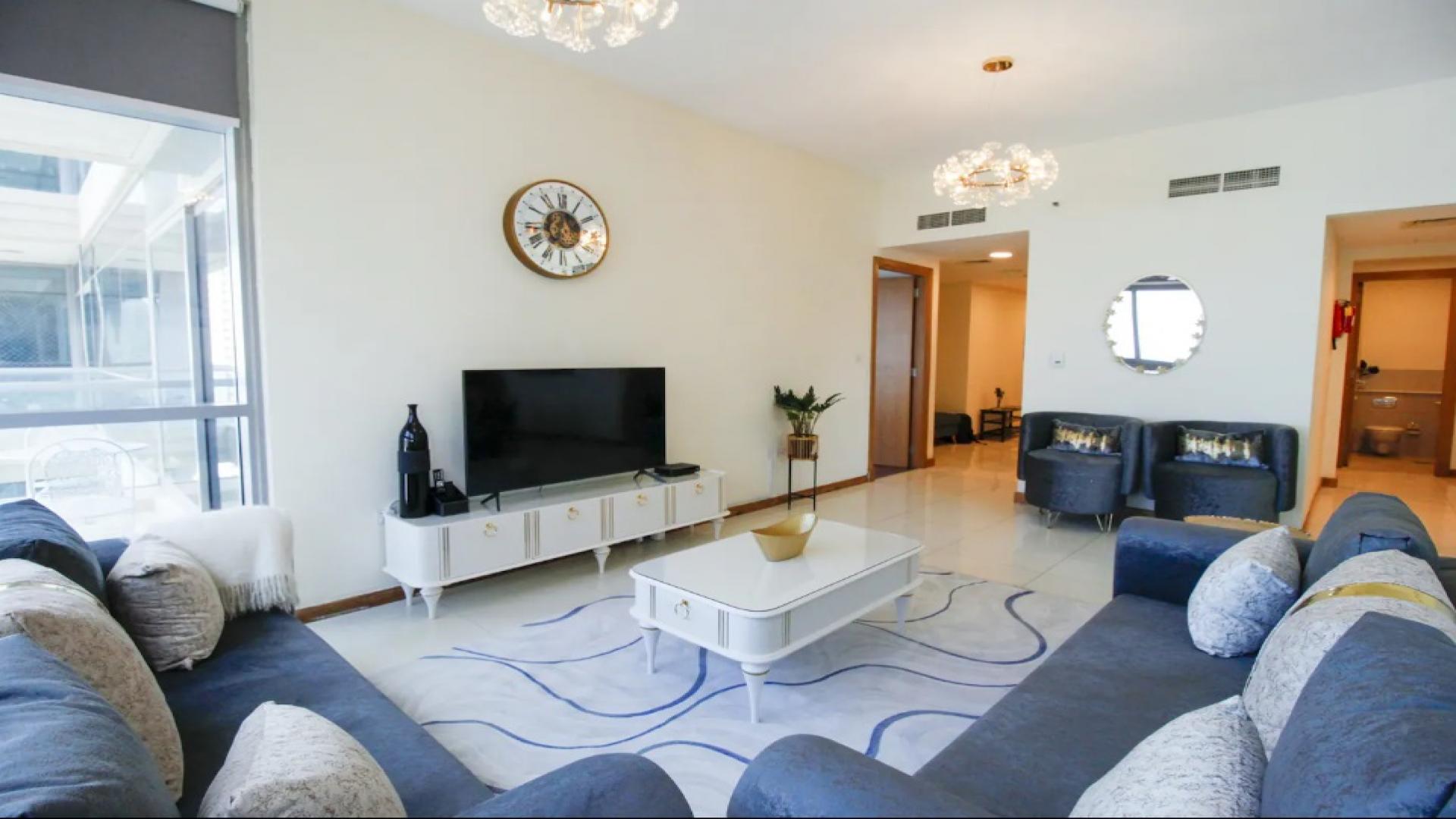 Luxurious living room in 3-bedroom apartment, Iris Blue, Dubai Marina with modern furnishings