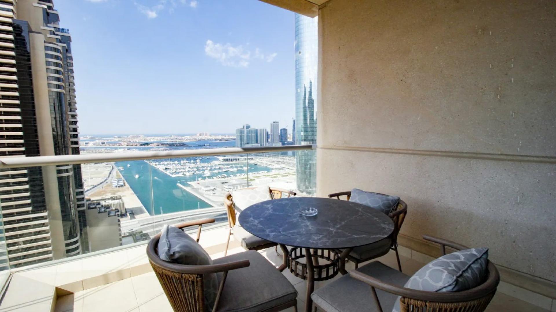 Luxurious living room in 3-bedroom apartment, Iris Blue, Dubai Marina, elegant furnishings