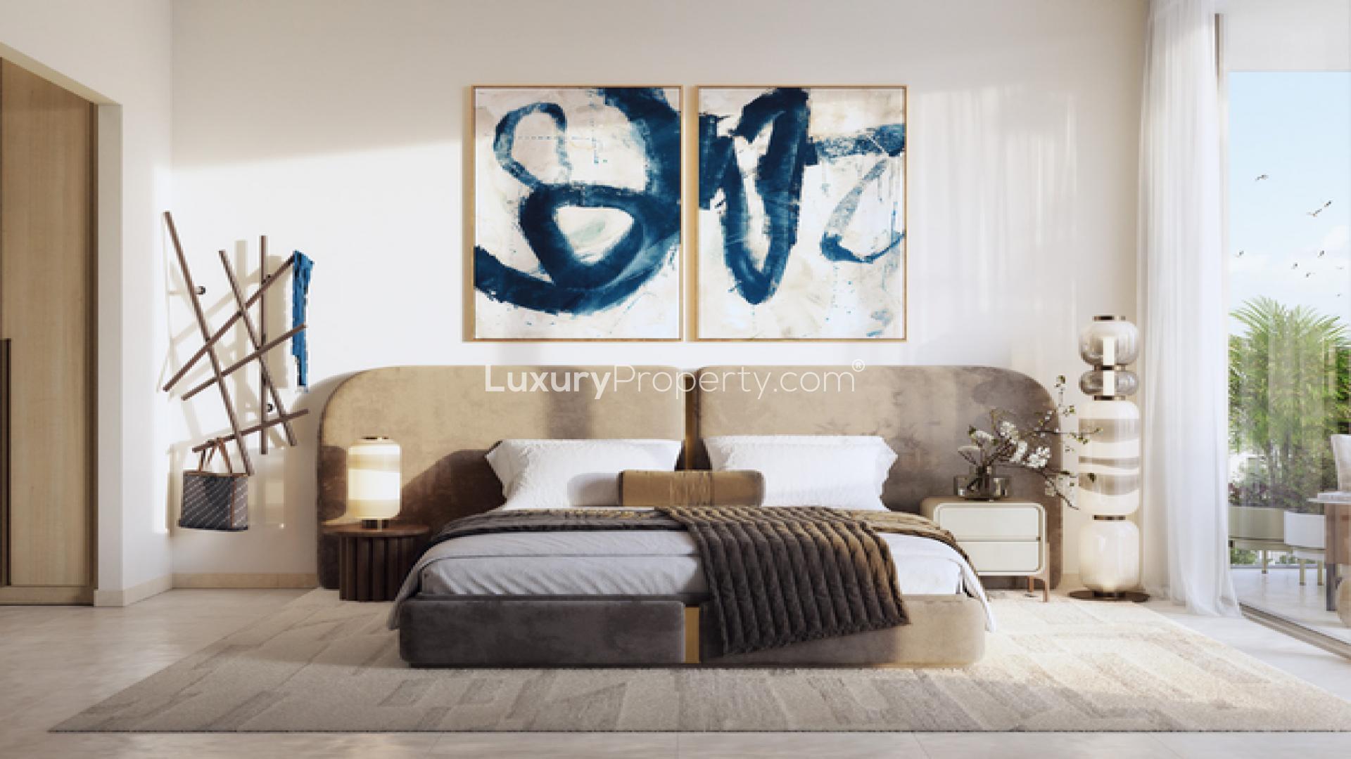 Modern bedroom interior in Mina Rashid apartment, featuring elegant decor and natural light