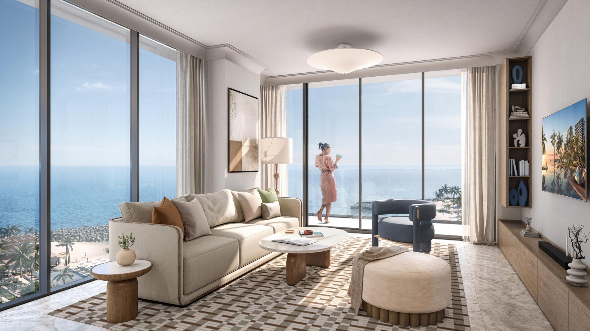 Luxurious Al Marjan Island apartment interior with ocean view, modern decor, and open layout