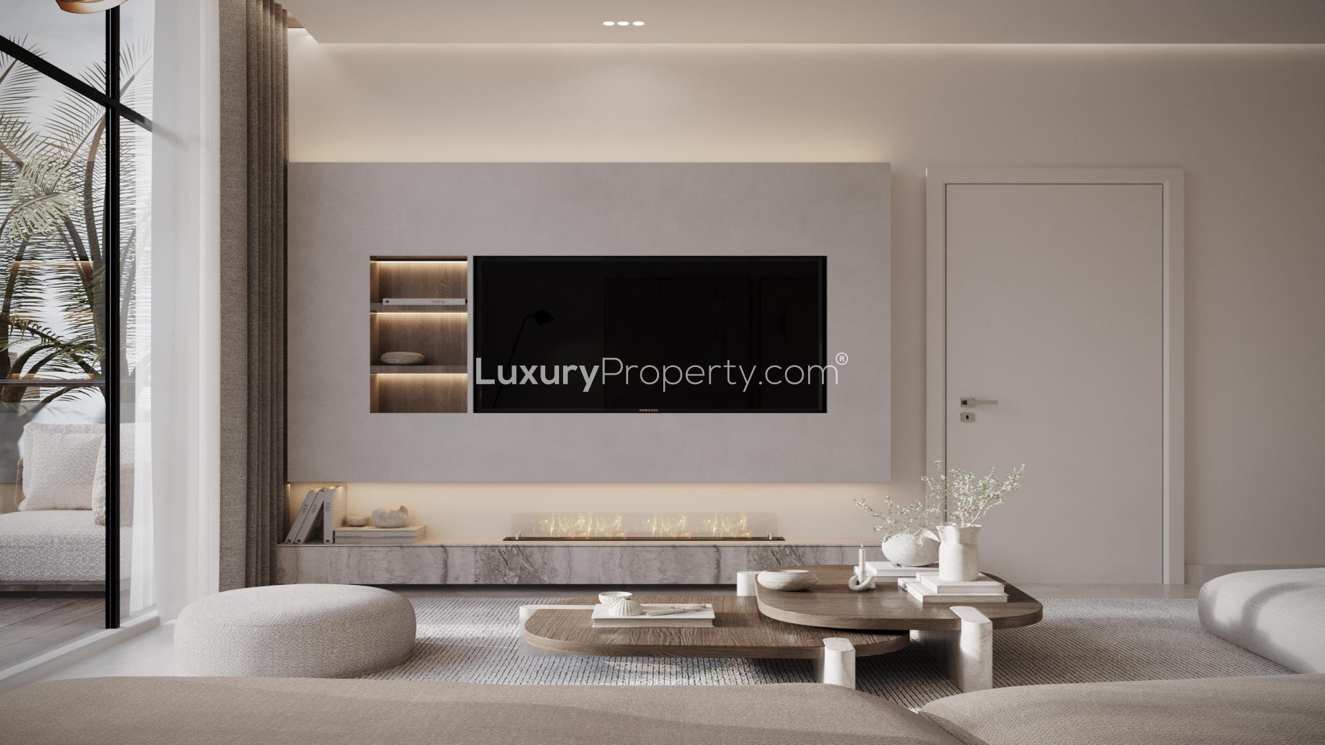 Modern living room in Aveline apartment, Jumeirah Village Circle, featuring elegant decor and lighting