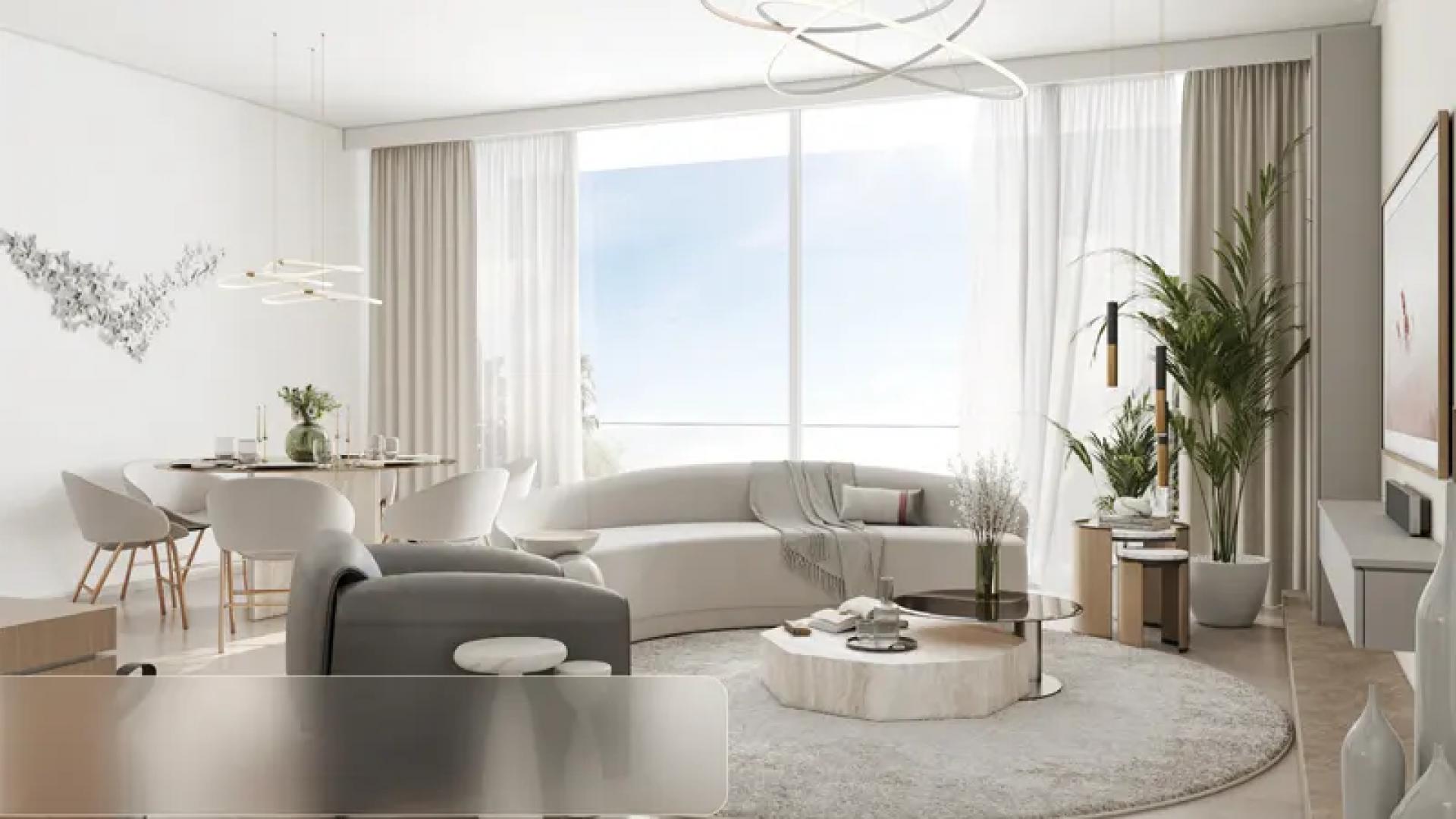 Modern living room in Arbor View apartment, featuring stylish decor and large windows