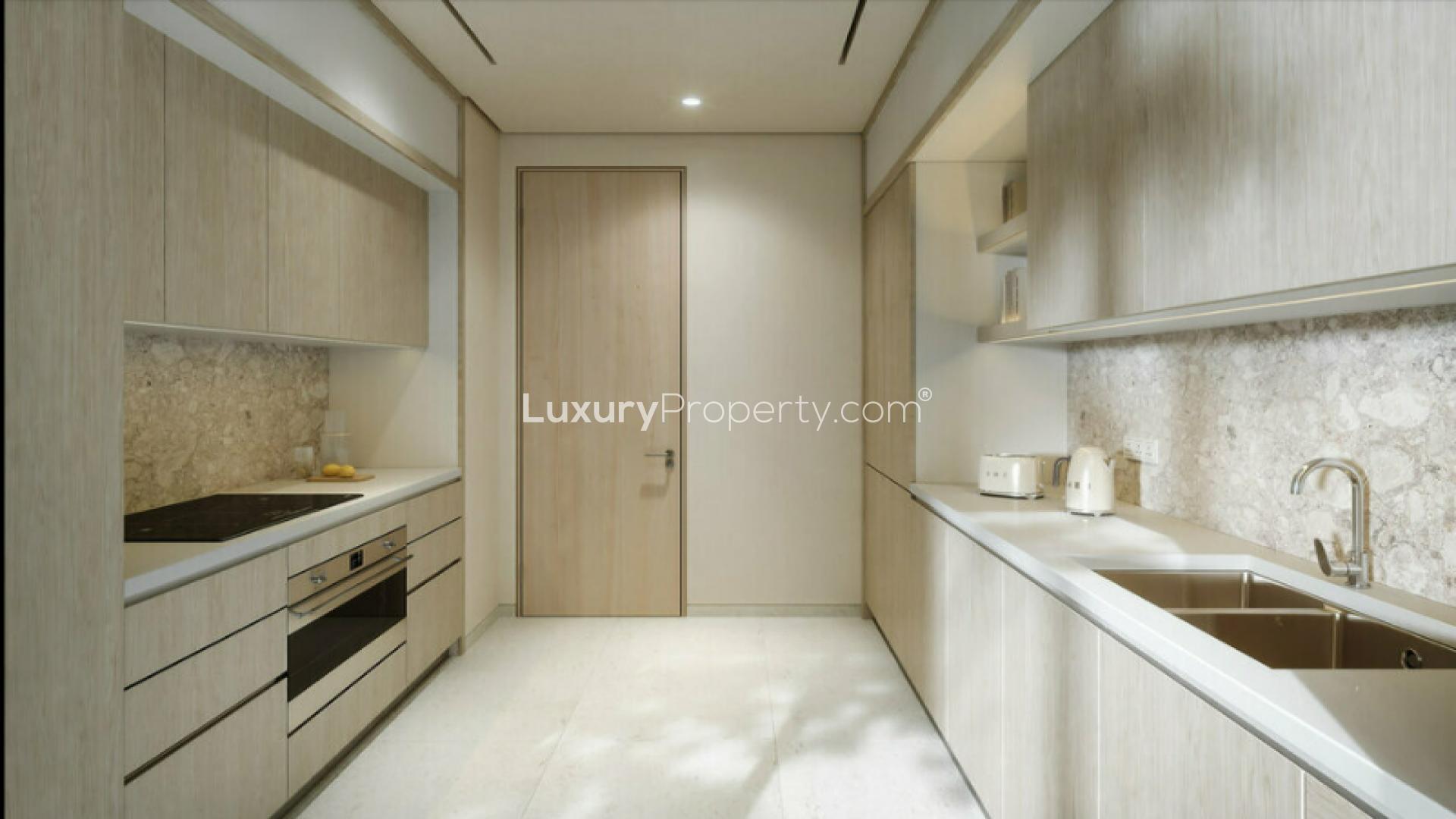 Eden House apartment building overlooking the canal in Al Satwa, Dubai skyline in background