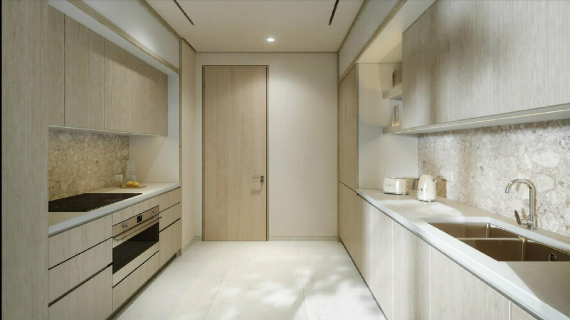 Eden House apartment building overlooking the canal in Al Satwa, Dubai skyline in background