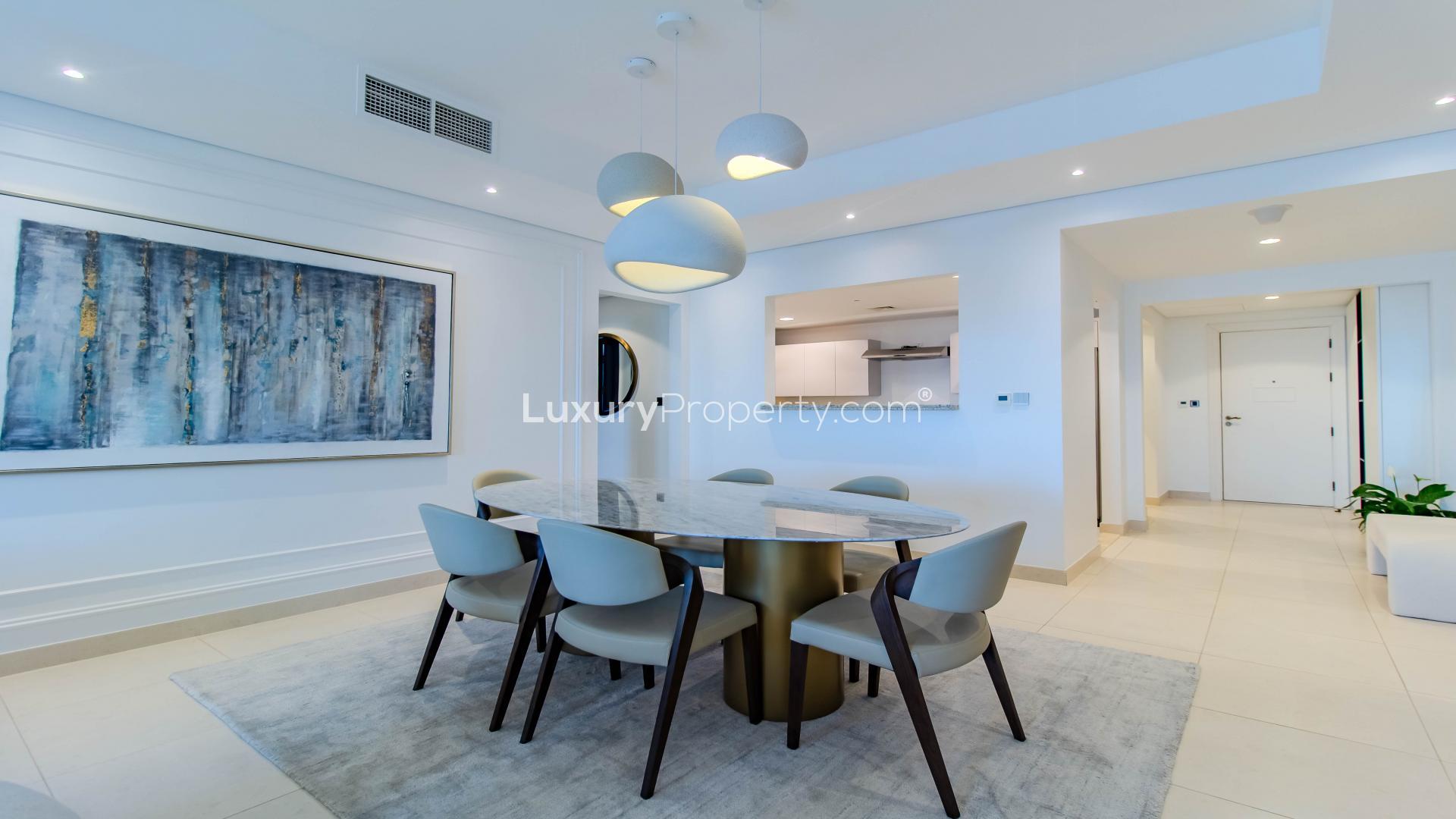 Modern living room in Palm Jumeirah apartment, featuring stylish decor and spacious layout