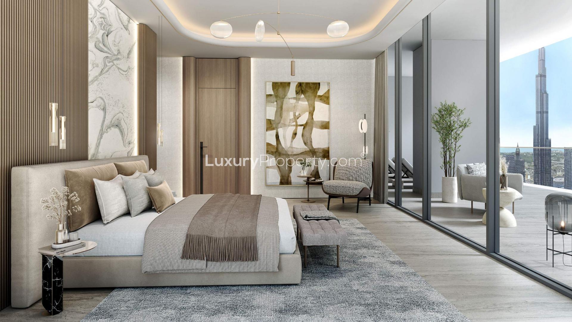 Luxurious bedroom with floor-to-ceiling windows at Rixos Financial Road, Downtown Dubai apartment
