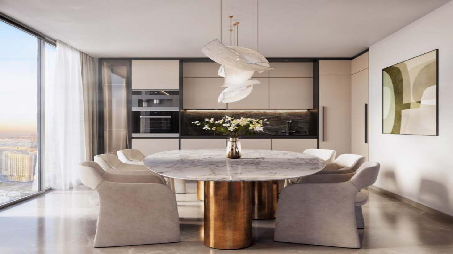 Modern living room in Helvetia Jumeirah Village Circle apartment, featuring elegant furniture and decor