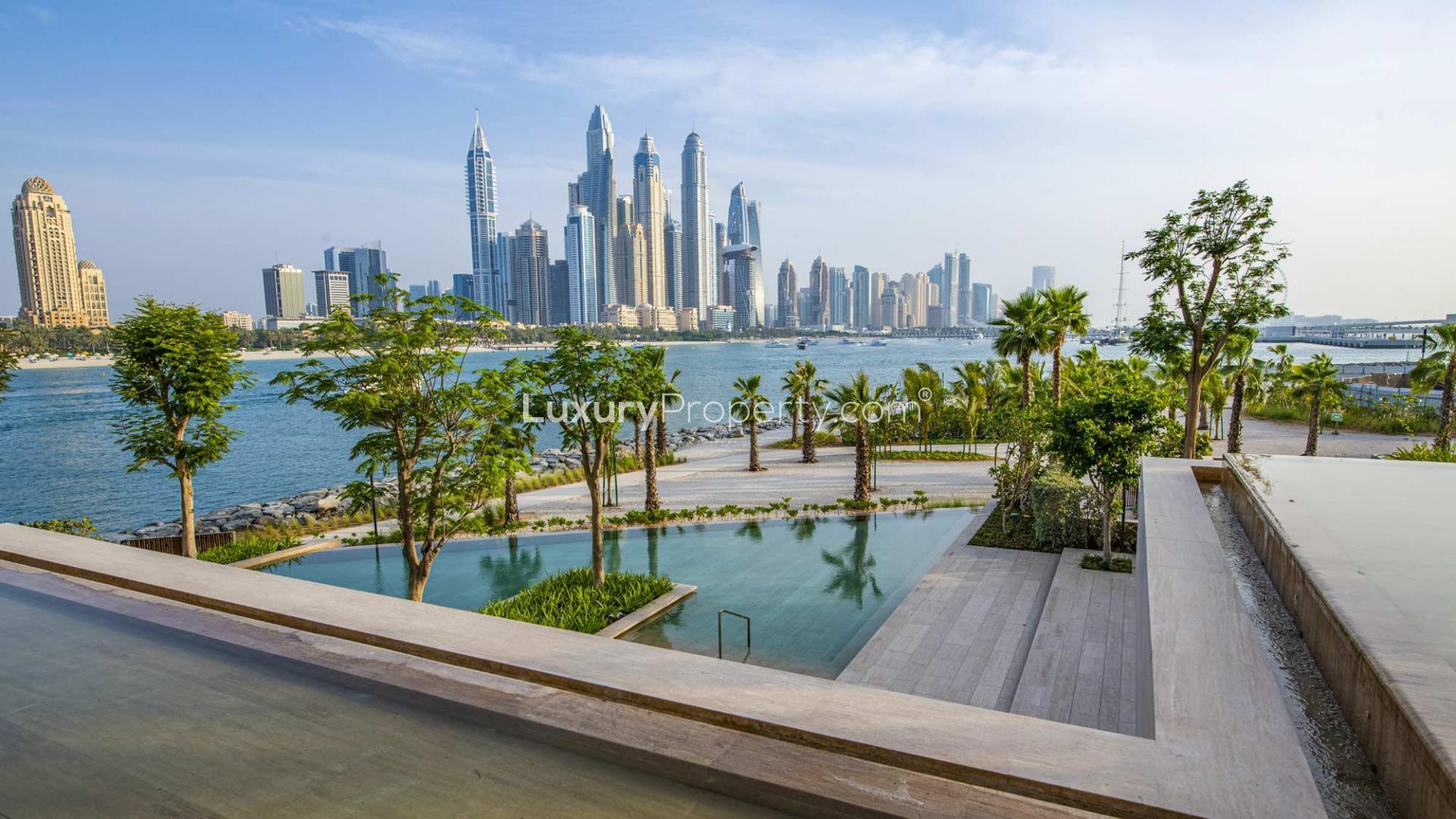 Luxurious terrace with pool and skyline view at ELA Residences, Palm Jumeirah apartment