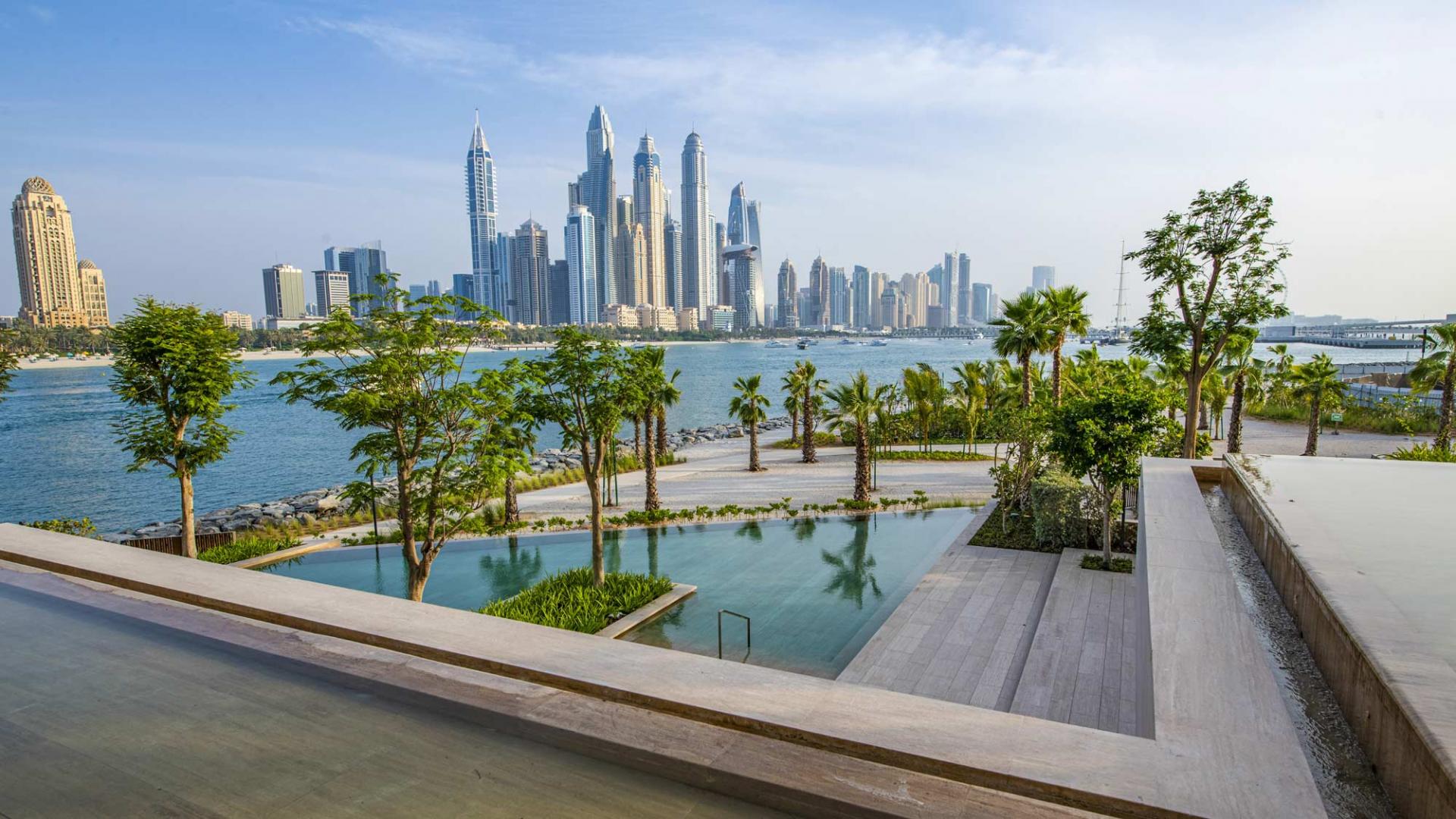 Luxurious terrace with pool and skyline view at ELA Residences, Palm Jumeirah apartment