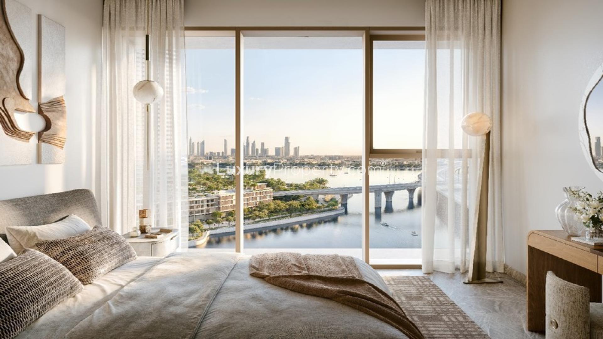 Modern living room with city skyline view at Palace Residences Creek Blue, Dubai Creek Harbour