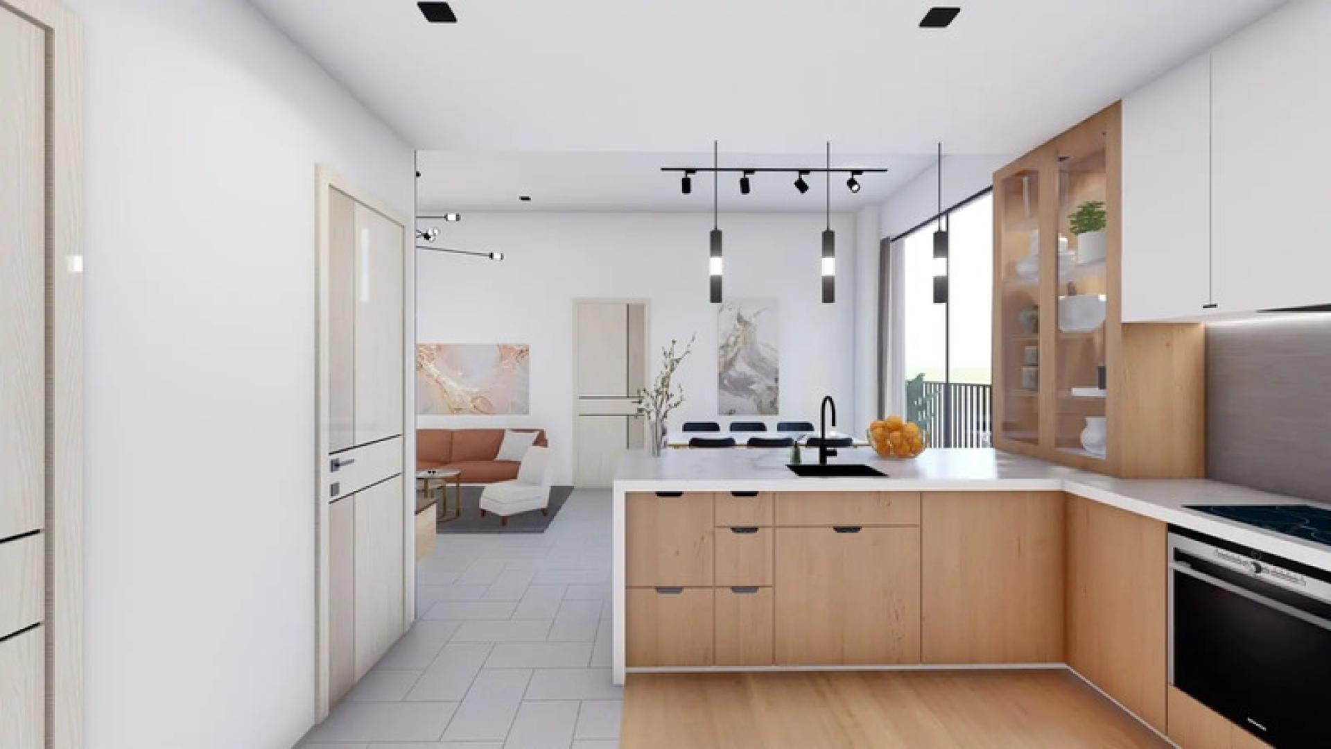 Modern kitchen and living area in Park Lane, Jumeirah Village Circle apartment for sale