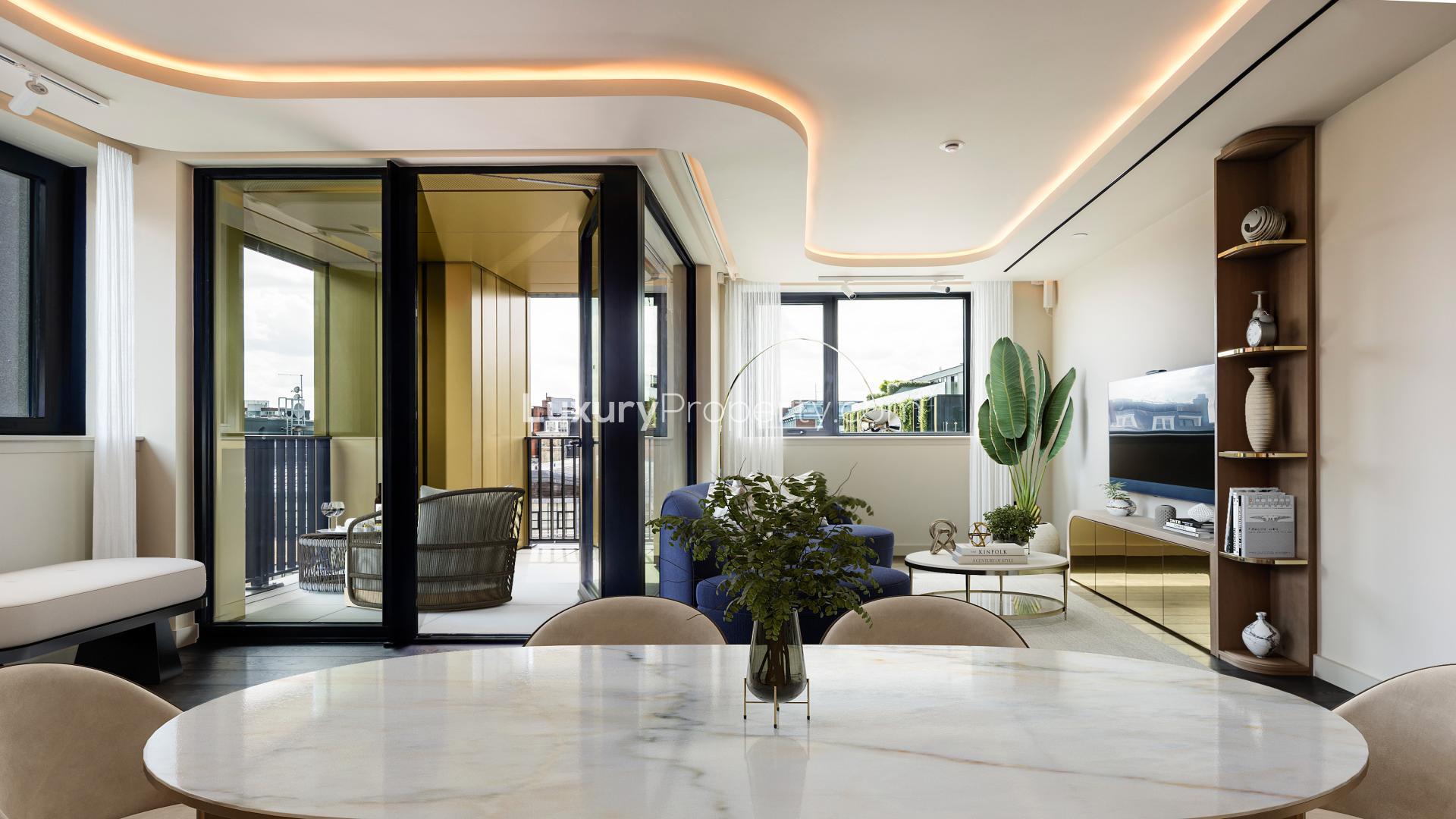 Modern living area in 3-bedroom West End apartment, London, with stylish furnishings and natural light