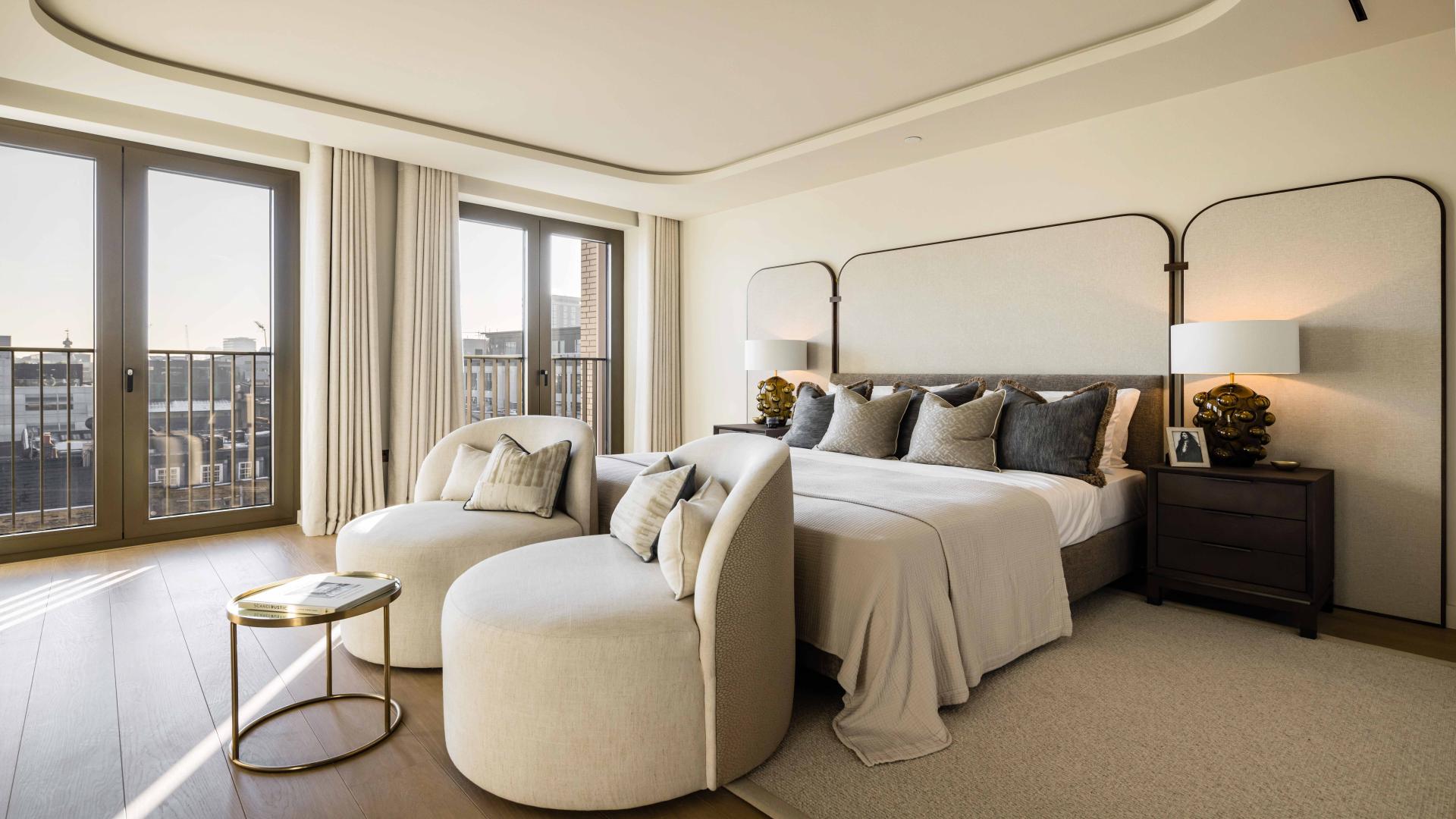 Luxurious living room in TCRW Soho, Central London apartment with modern decor and balcony view