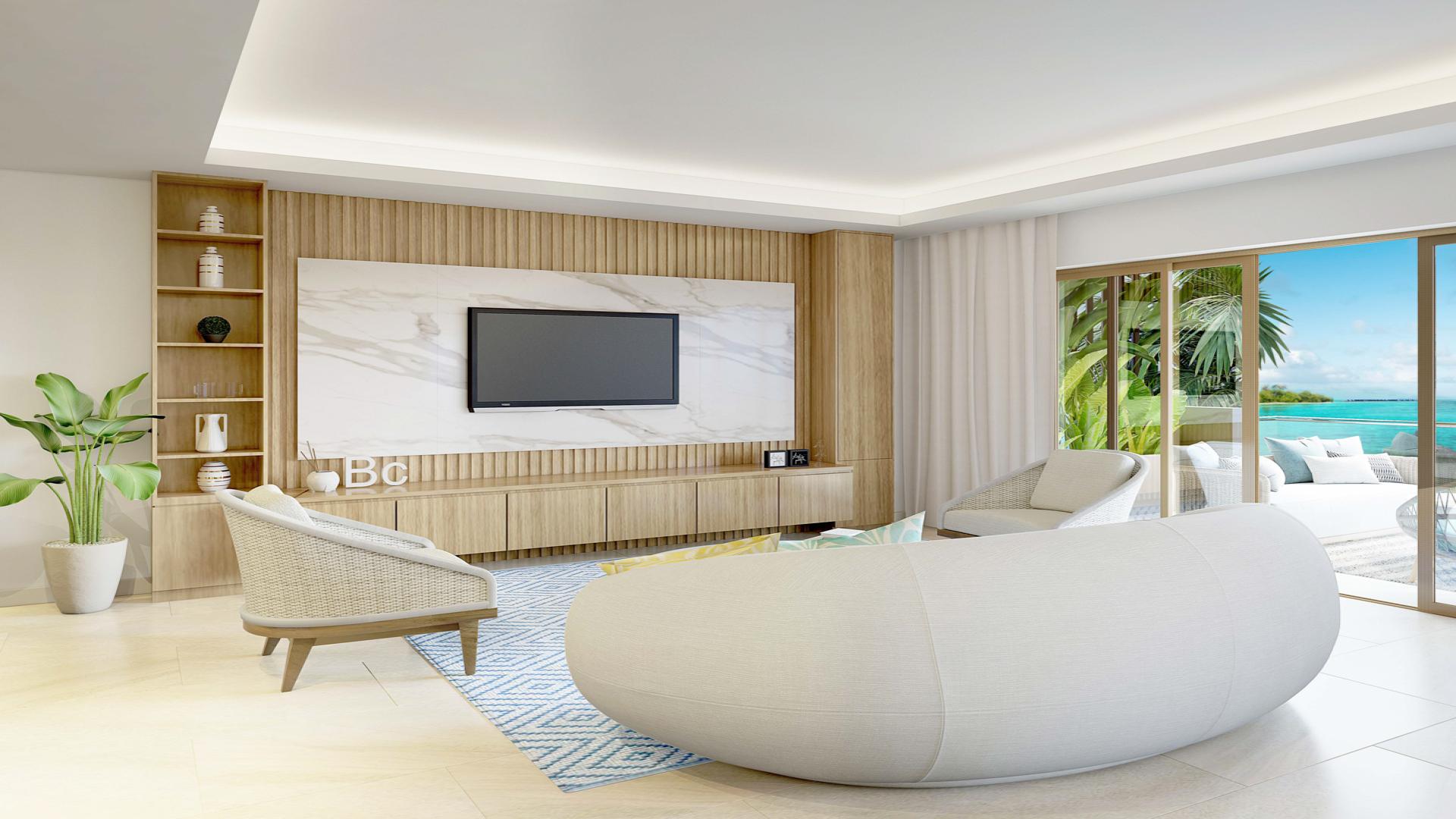 Modern living room with ocean view at Coral Residences